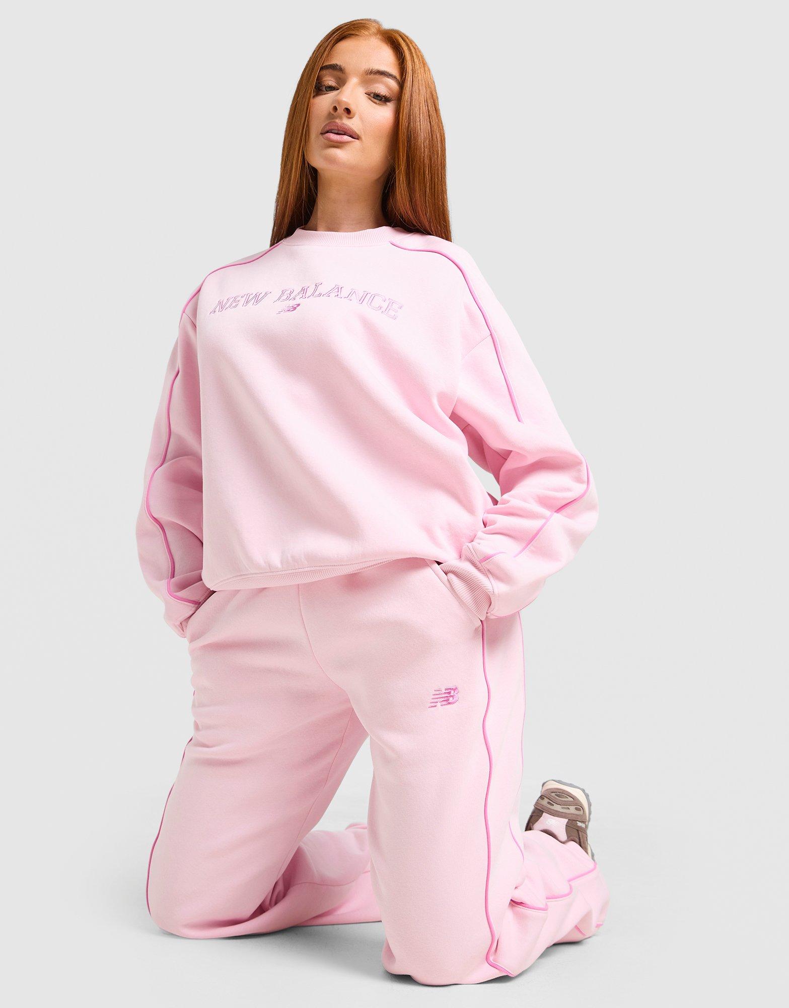 New Balance Pantaloni della tuta Wide Leg Pipe