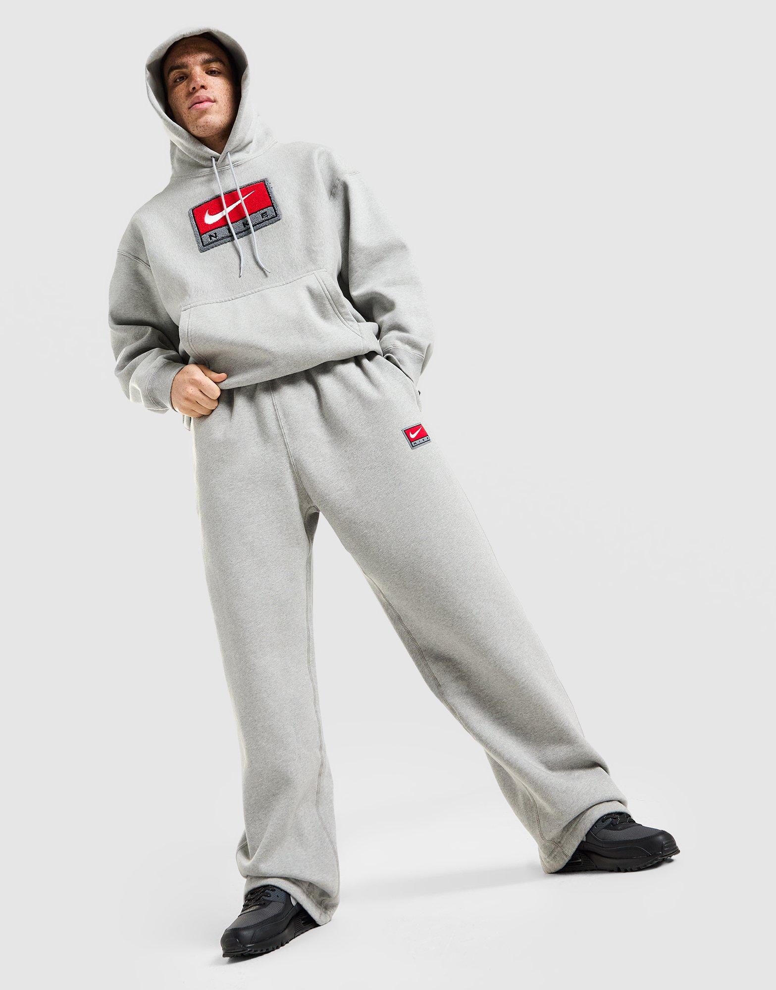 Nike Pantaloni della Tuta Solo Swoosh a Fondo Aperto