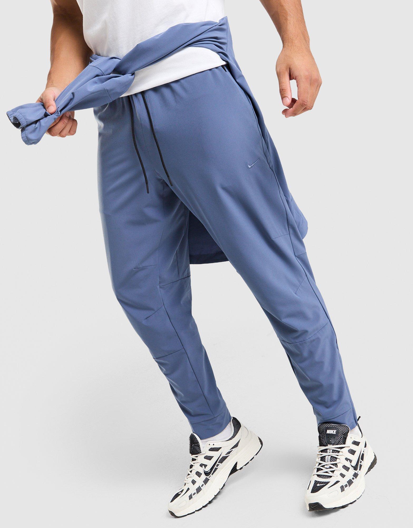 Nike Pantaloni Track Woven Unlimited