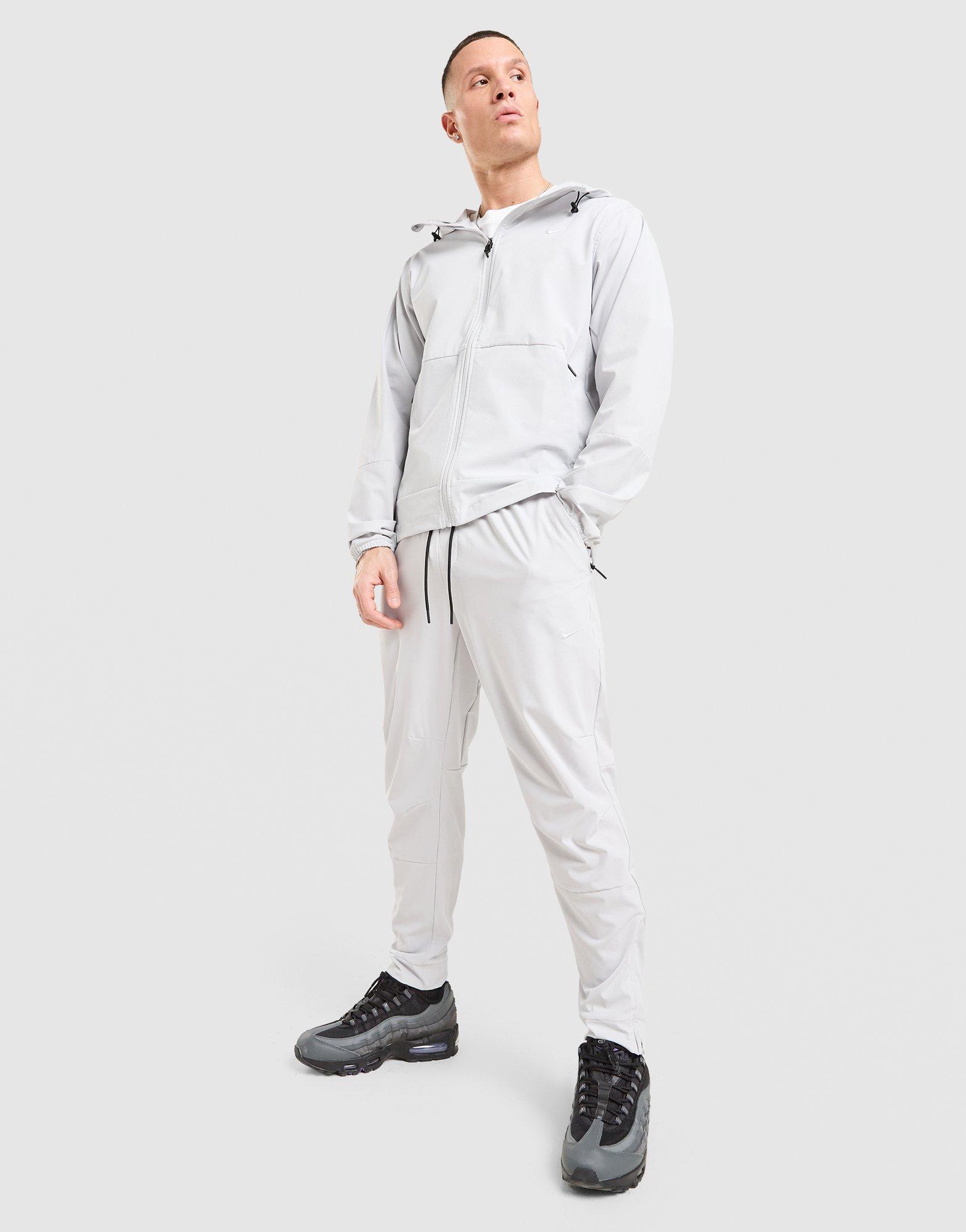 Nike Pantaloni Track Woven Unlimited