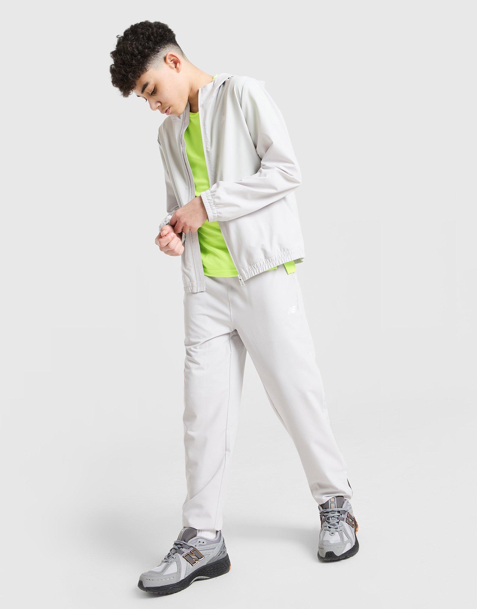 New Balance Pantalón de chándal Woven júnior