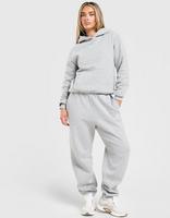 Nike Oversized damesbroek met hoge taille en omgeslagen pijp Studio Fleece middelzwaar