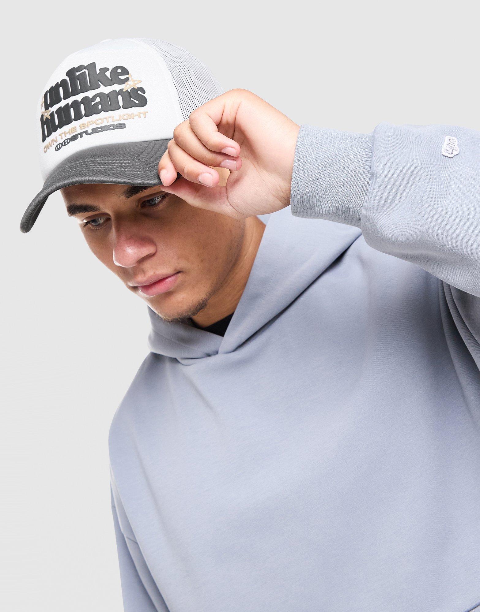 Unlike Humans Spotlight Trucker Cap