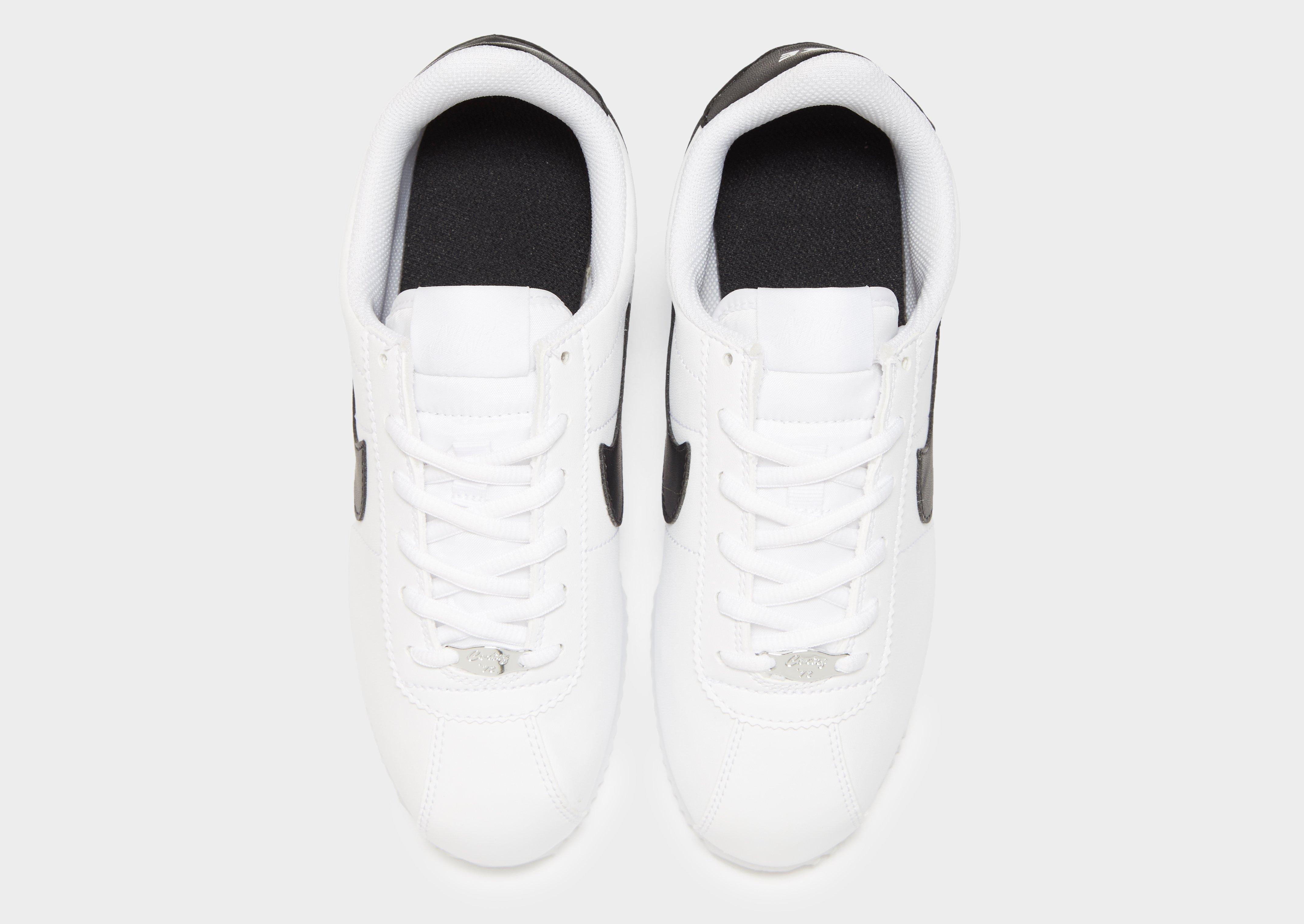 All white clearance nike cortez kids