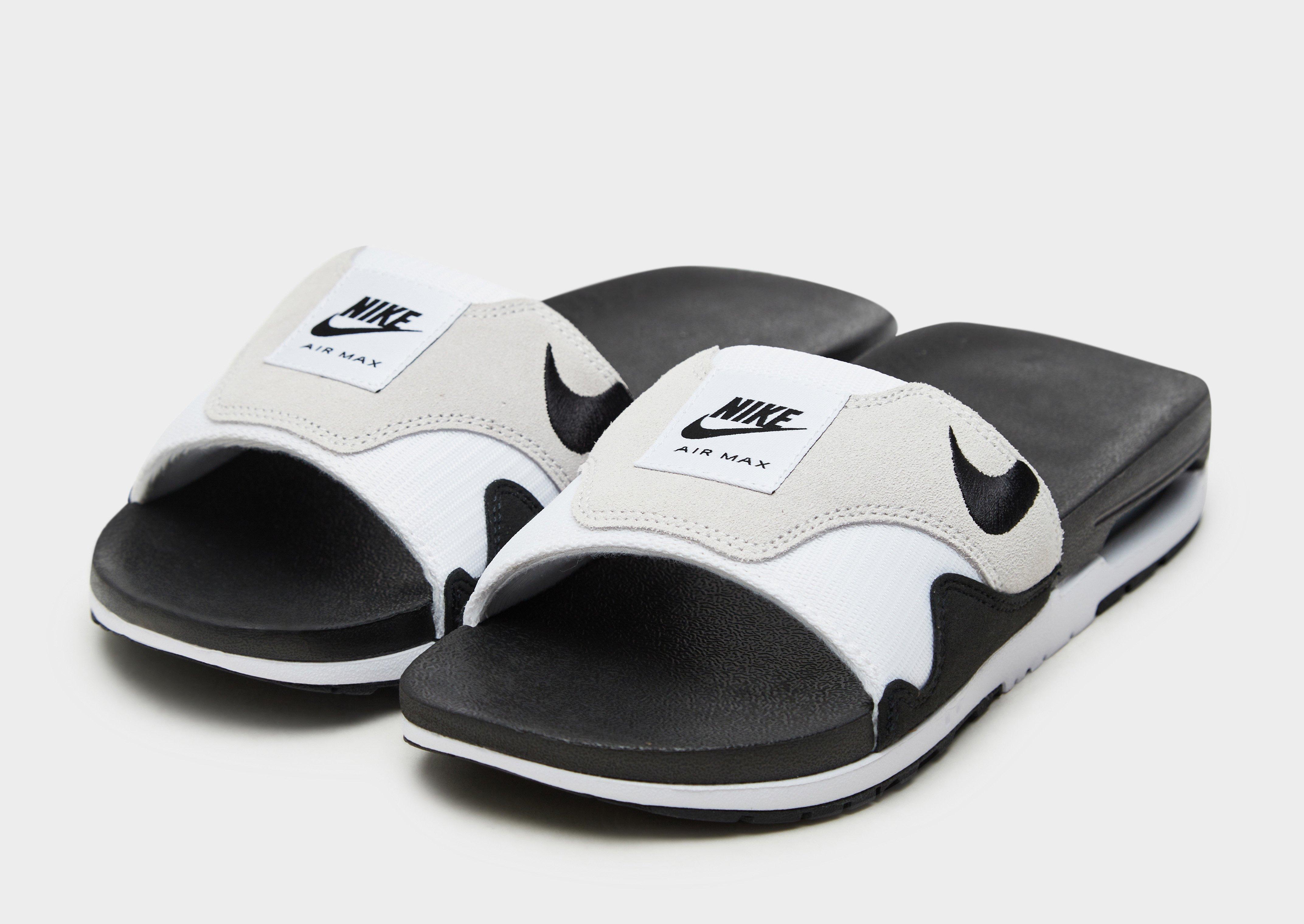 Nike slides store black and white