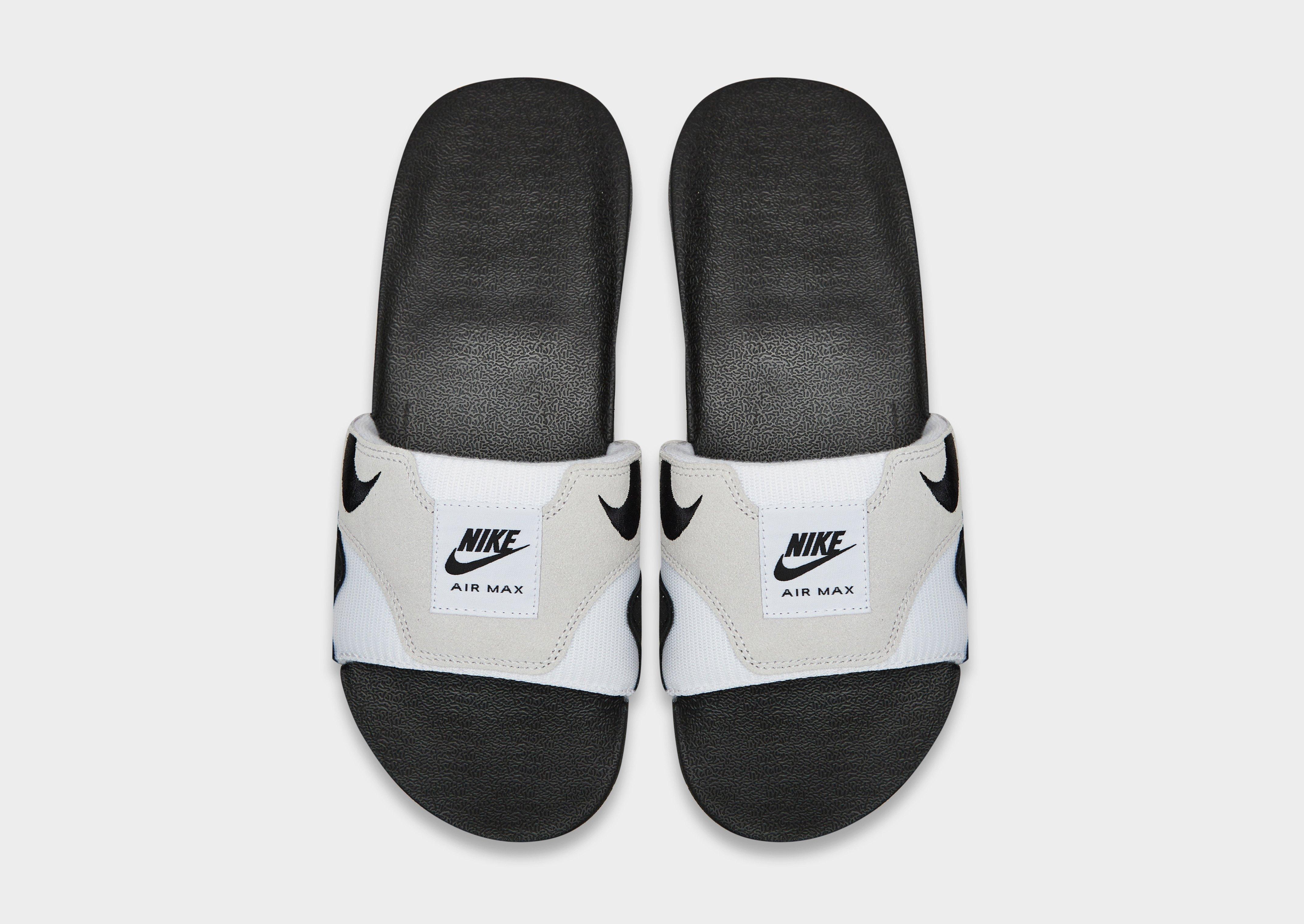 All white deals nike slides