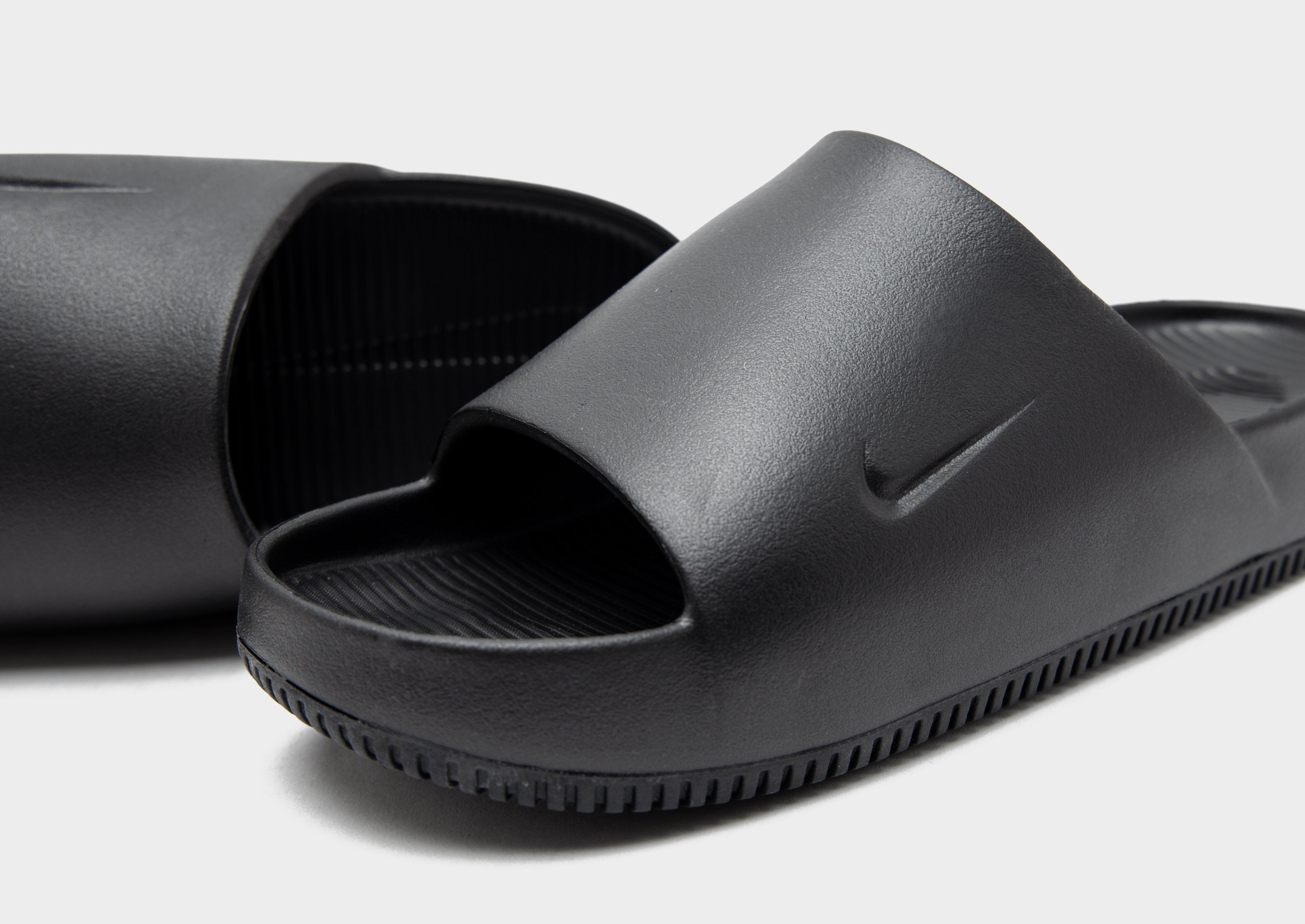 Mens black best sale nike slides