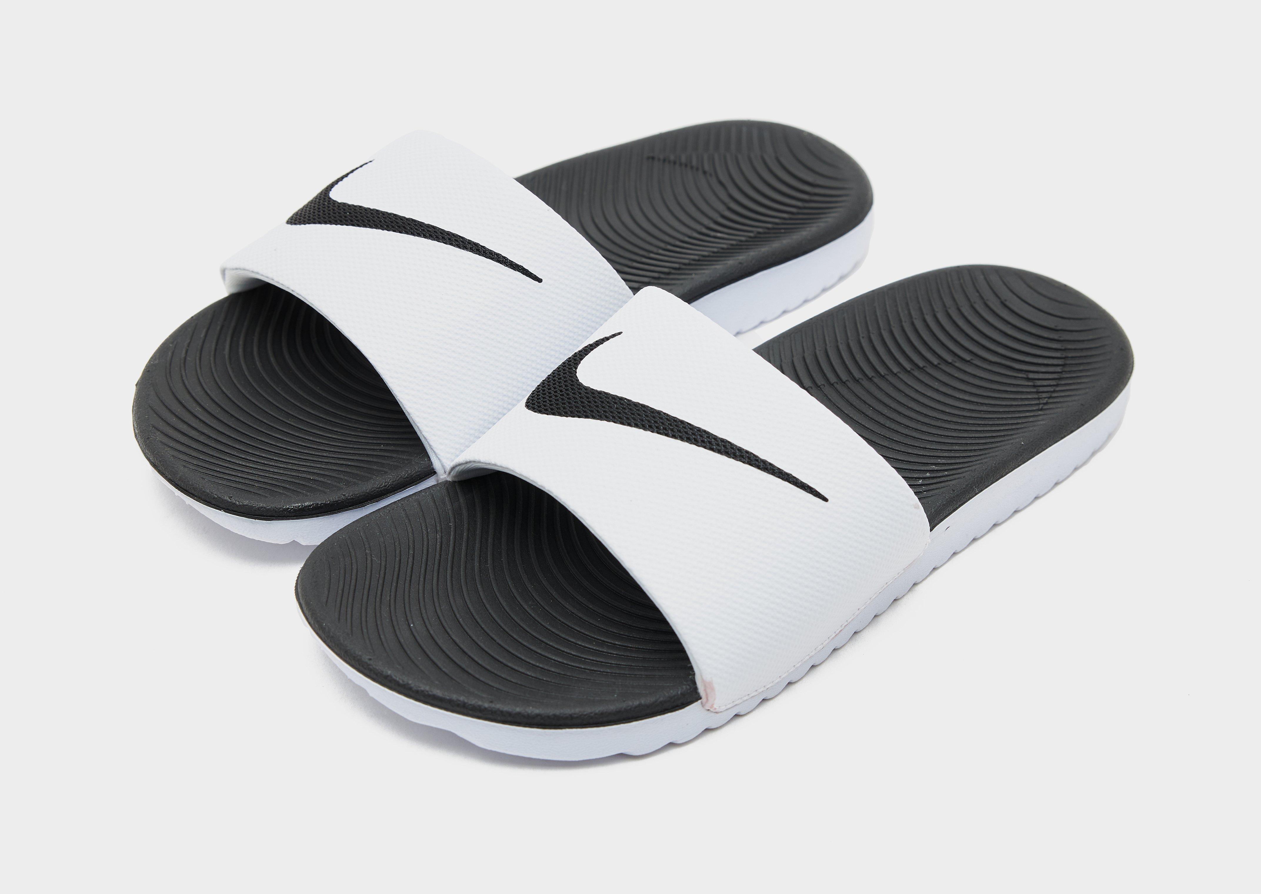 Nike slides deals junior