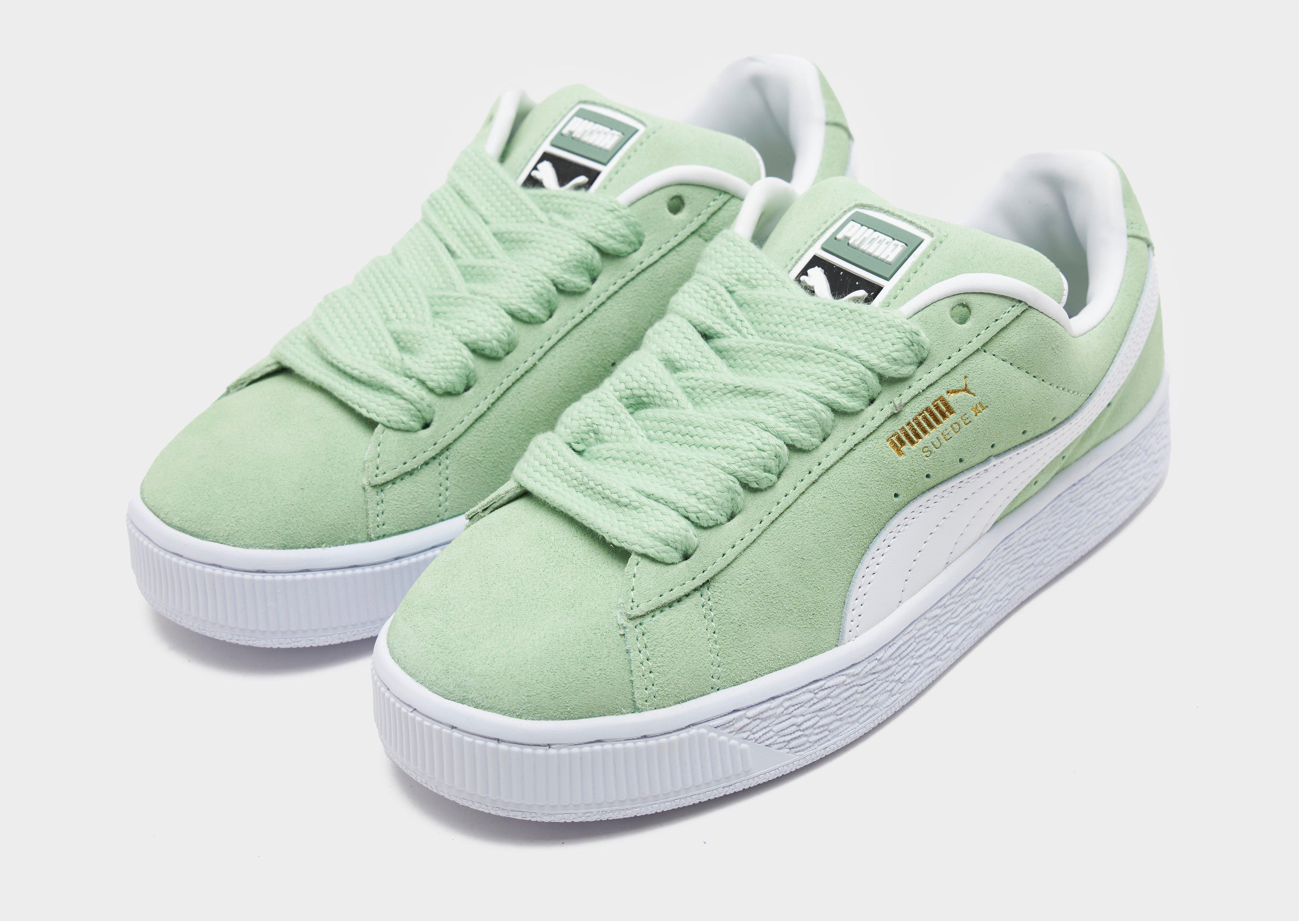 Green and clearance white suede pumas