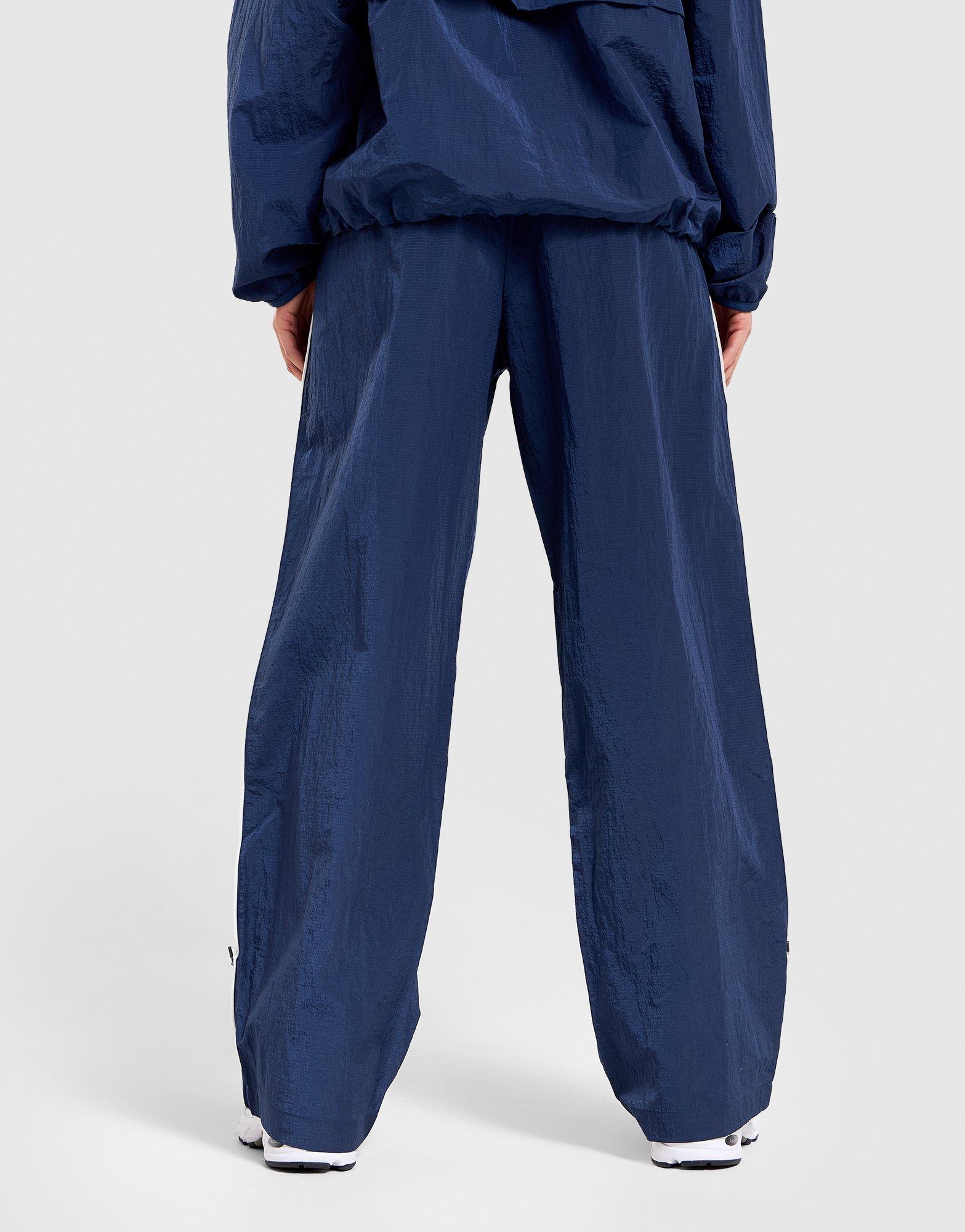 New Balance Sport Legacy Woven Track Pants