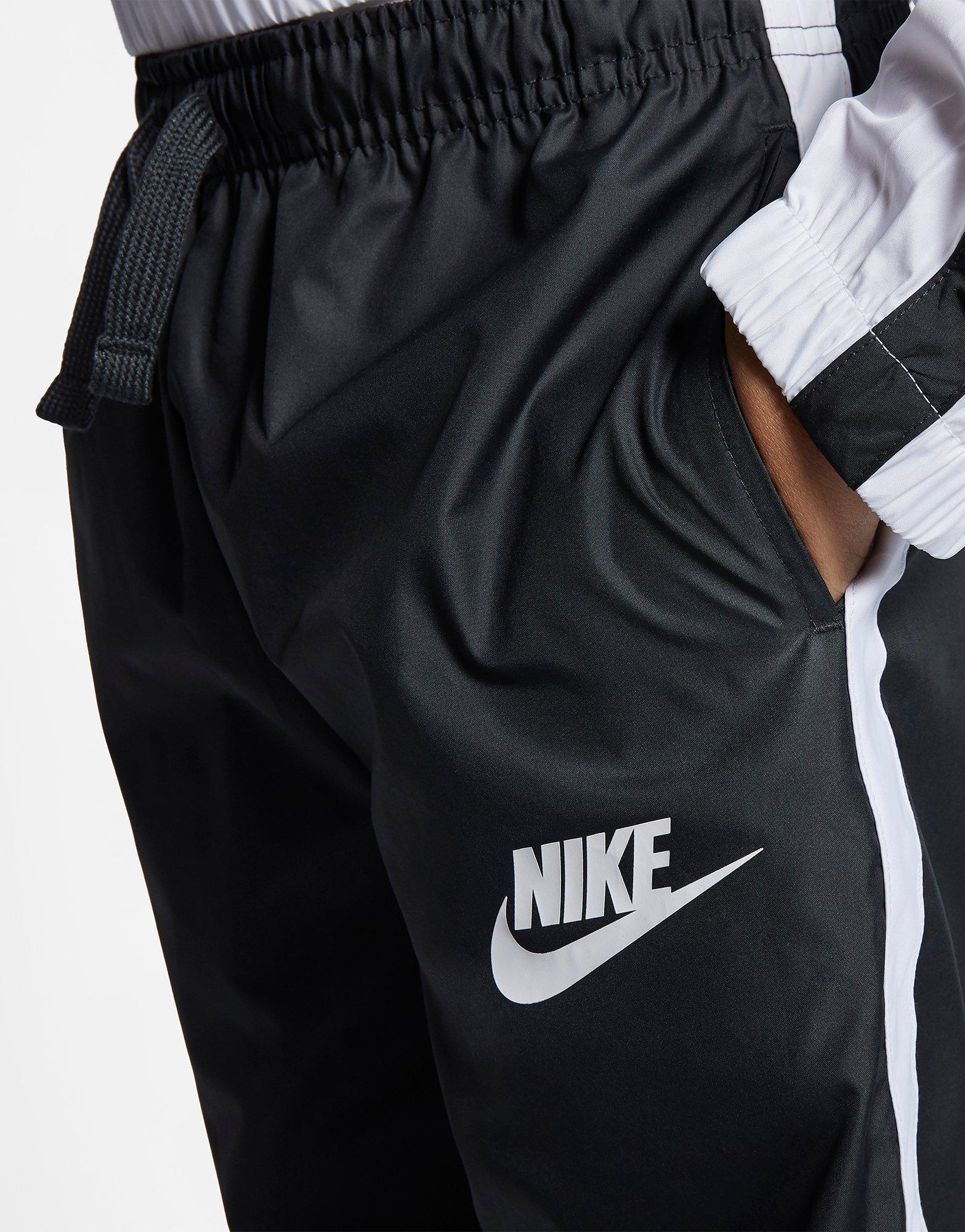 nike season woven suit