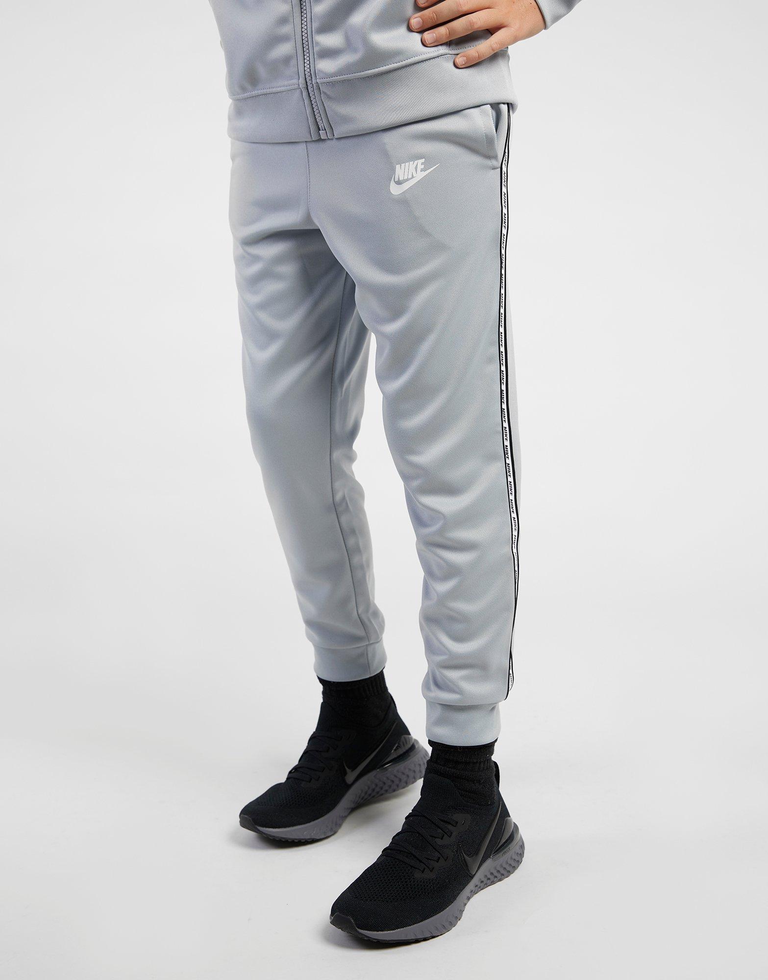 nike poly track pants womens