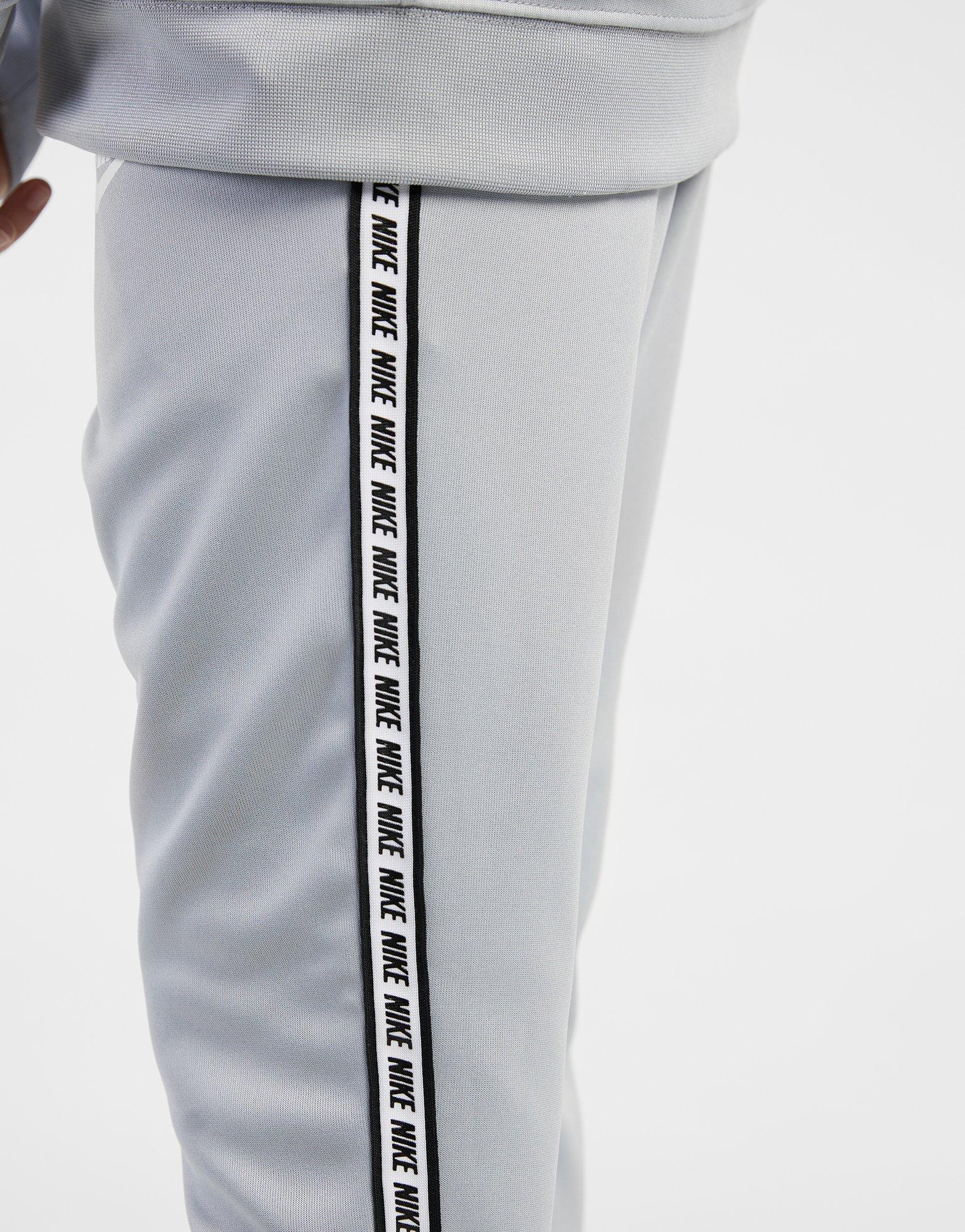 nike poly track pants womens