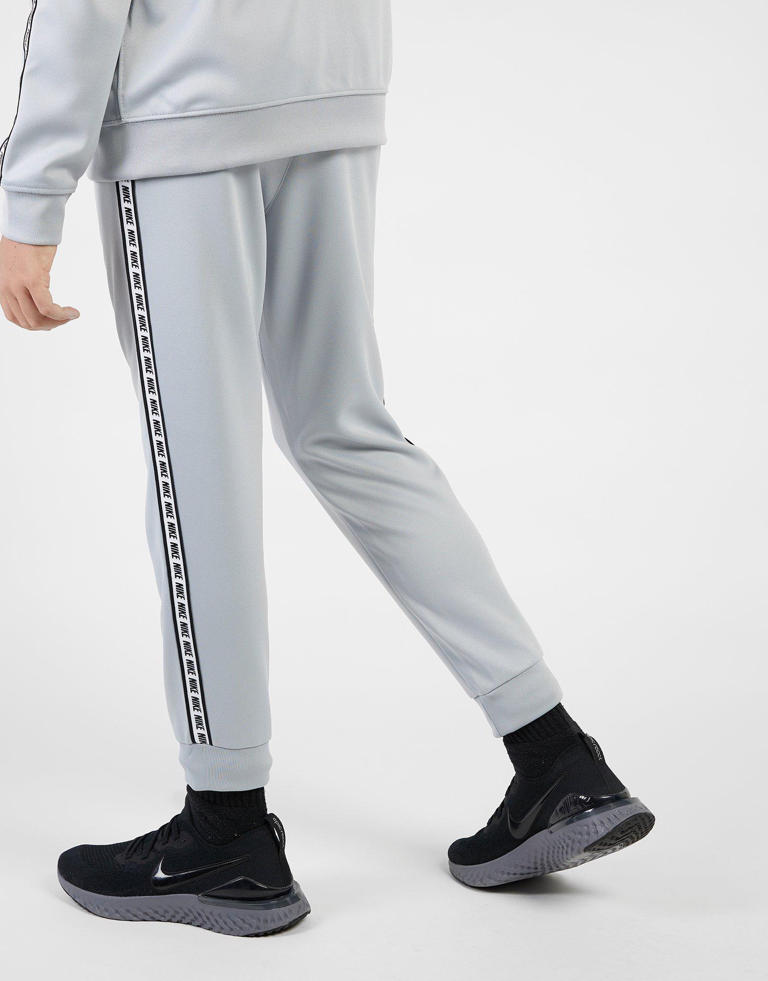 nike poly track pants womens