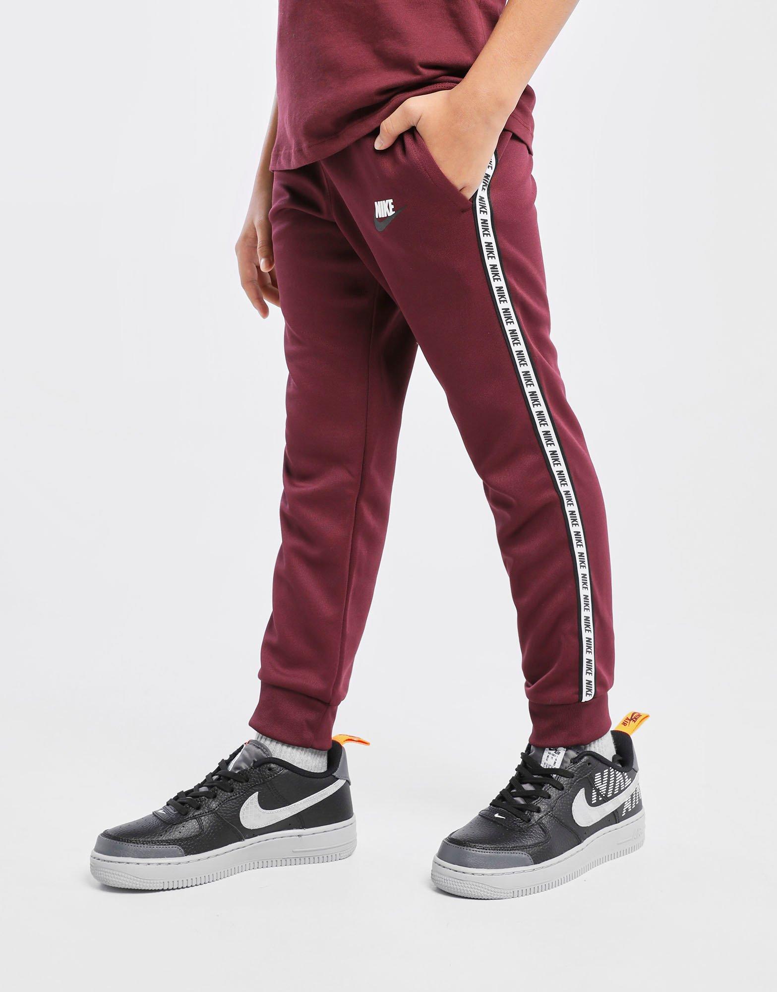 nike repeat poly pants