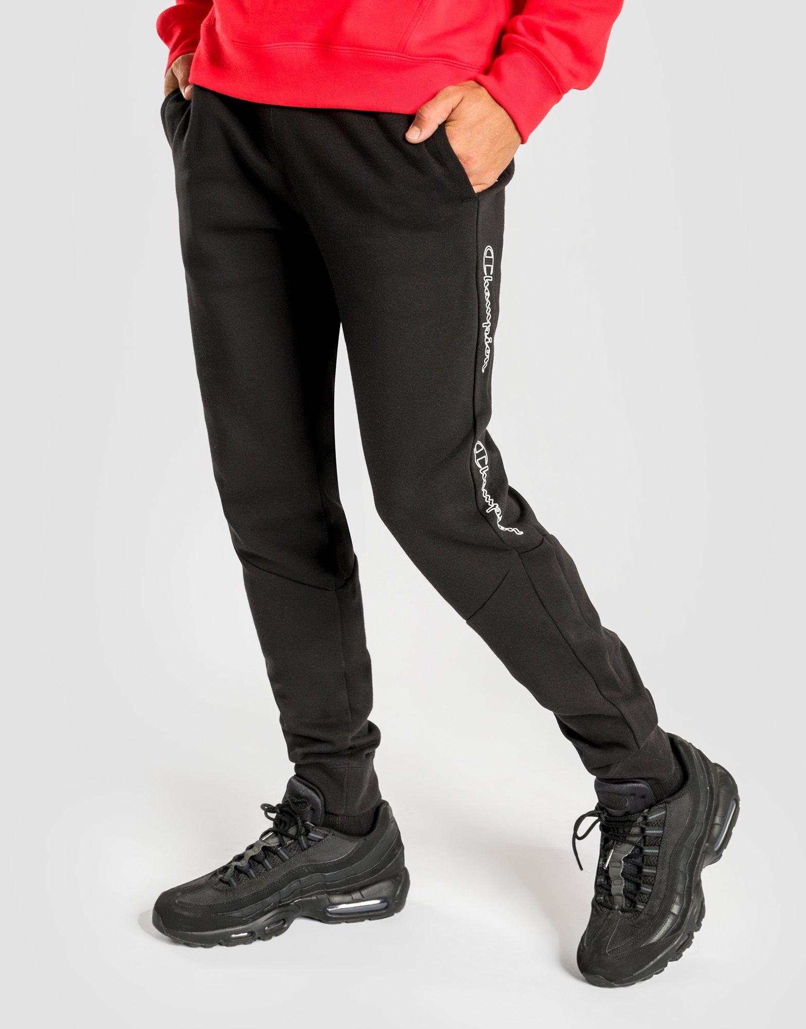 champion black and red taping track pants