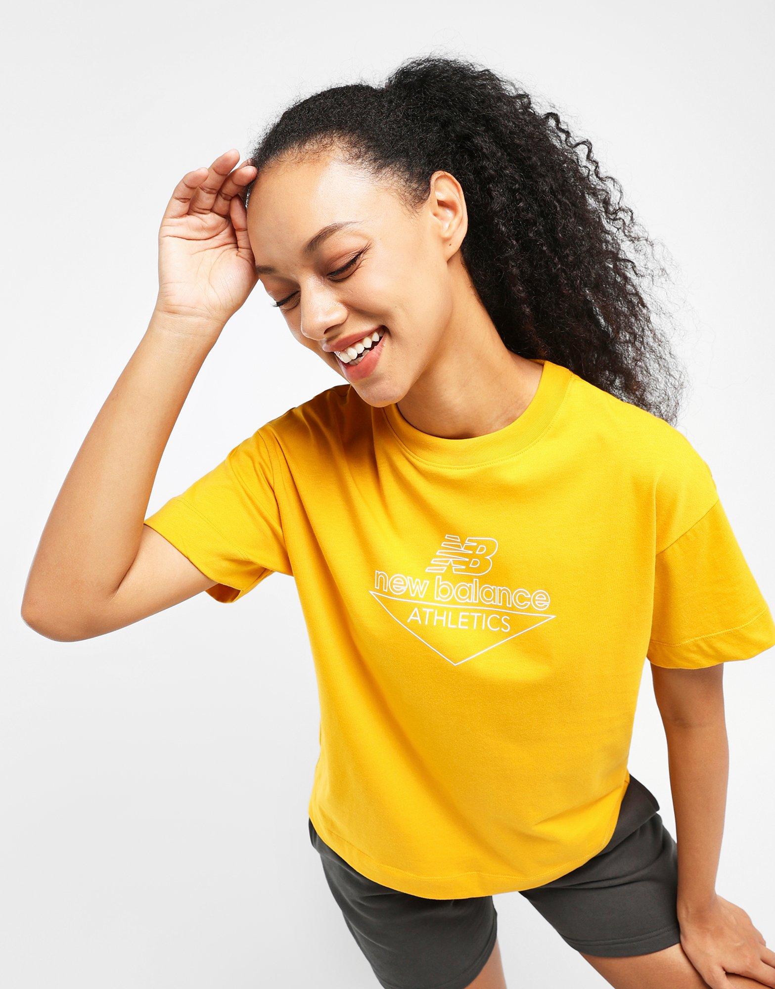 New balance yellow outlet t shirt