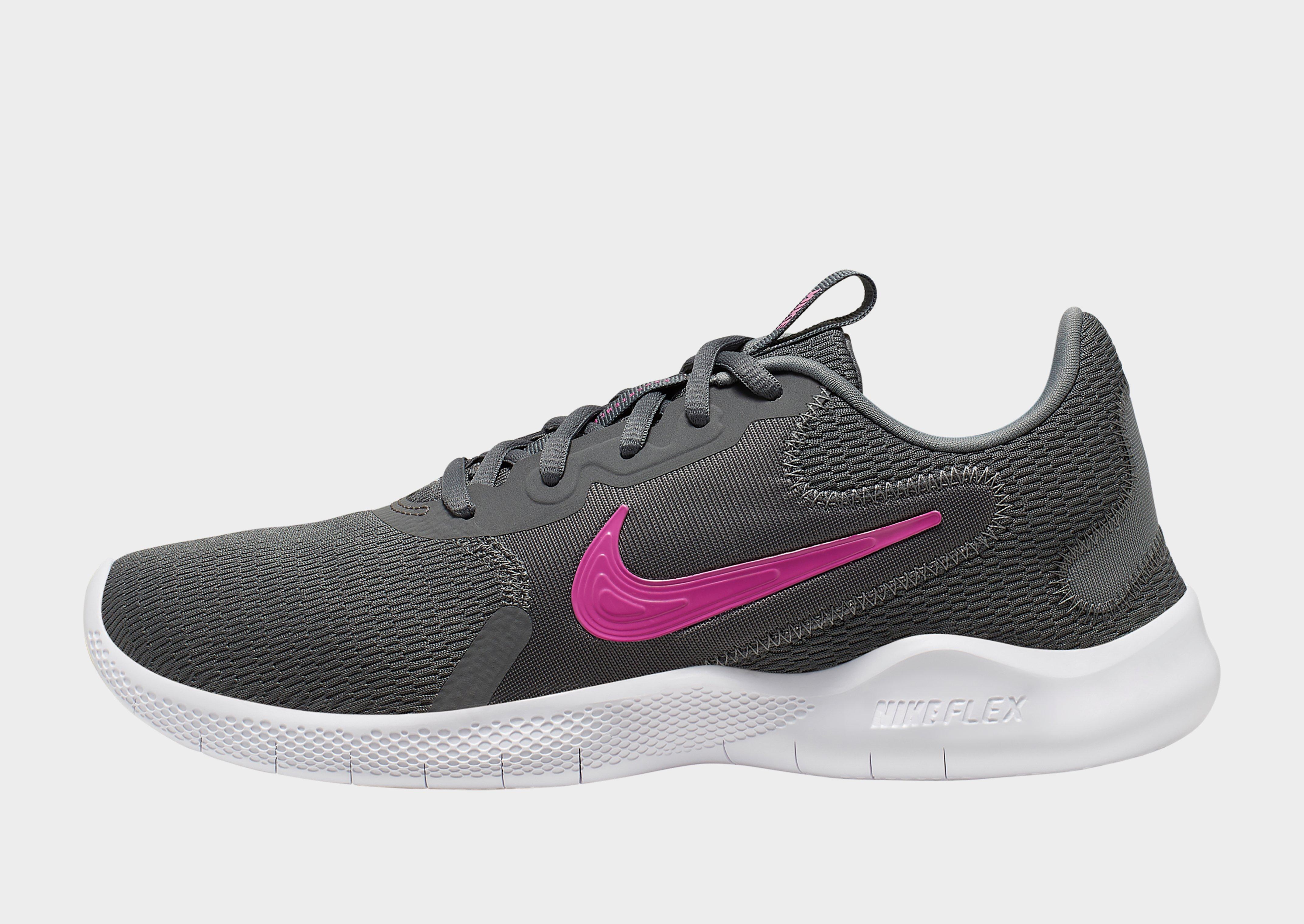 nike training flex trainers in grey with peach swoosh