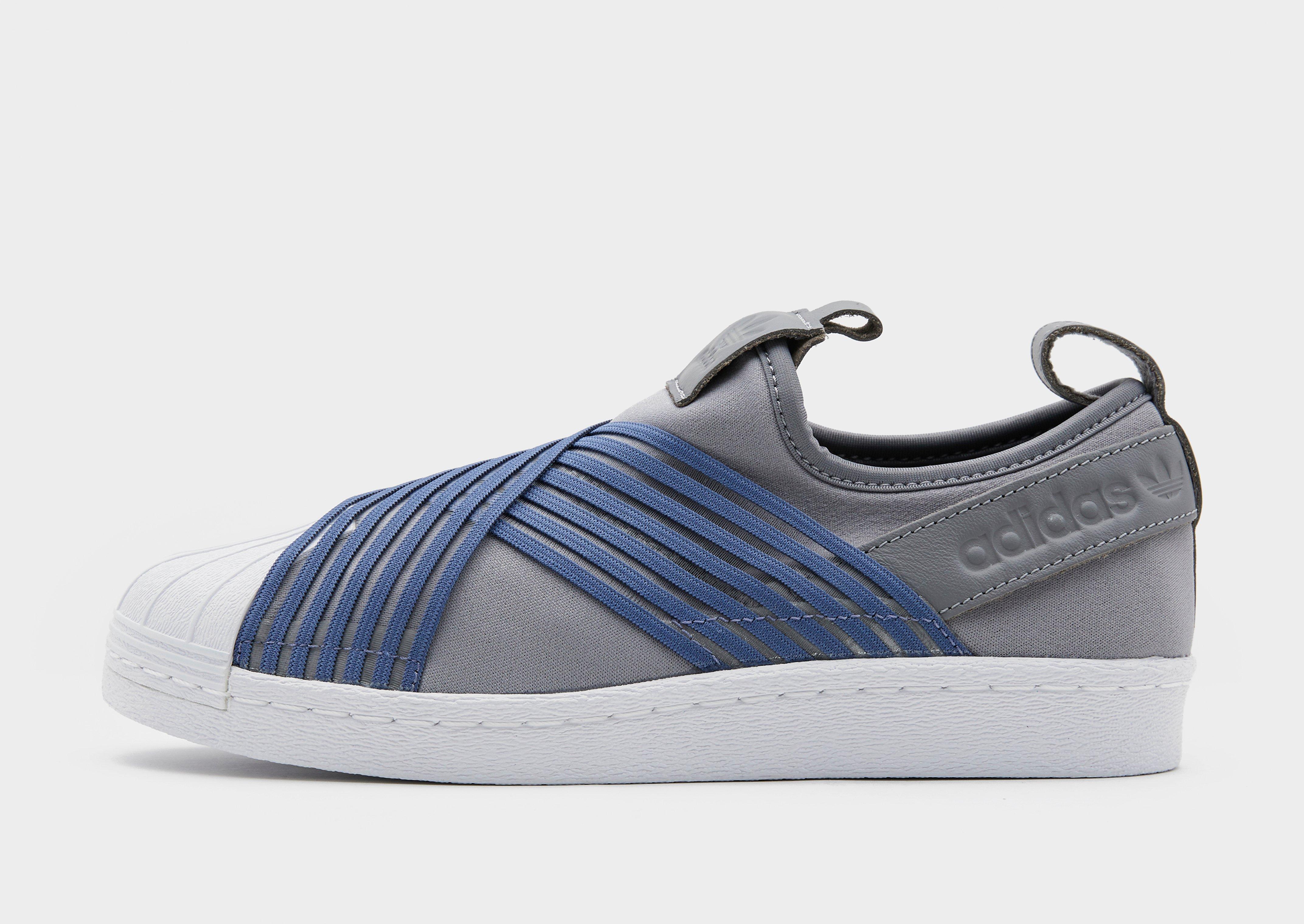 blue adidas slip on