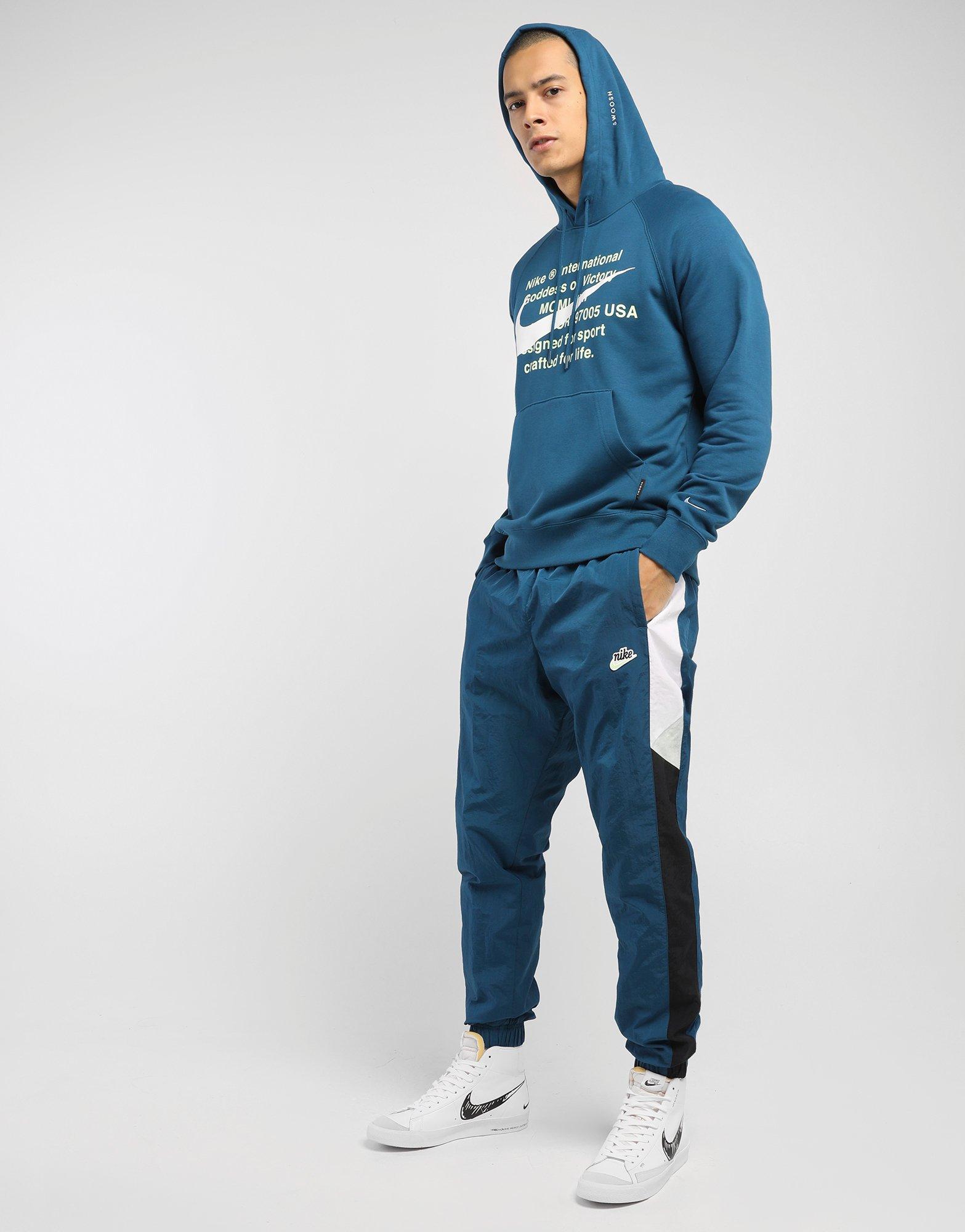 Blue Nike Windrunner Pants | JD Sports