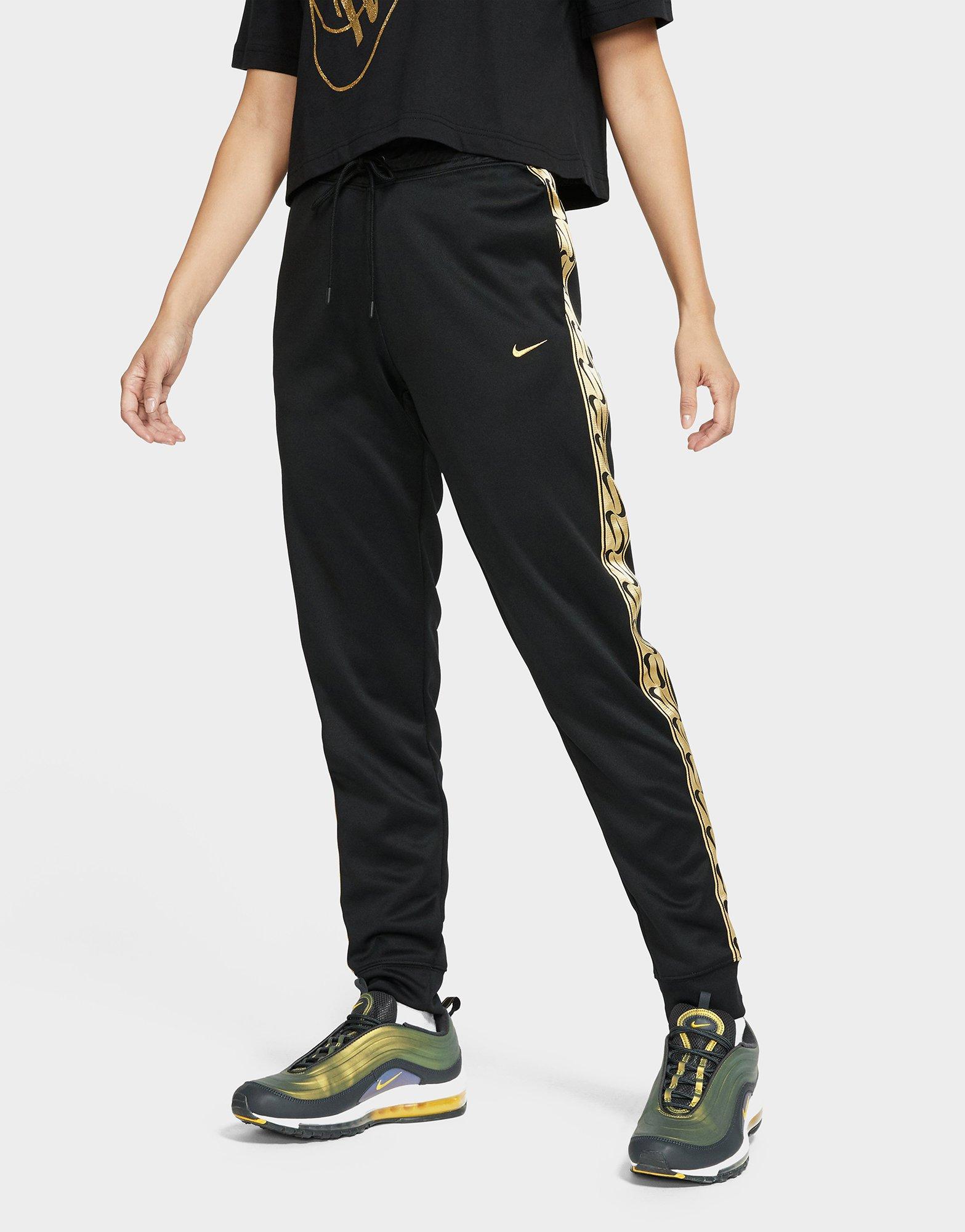 tape poly track pants