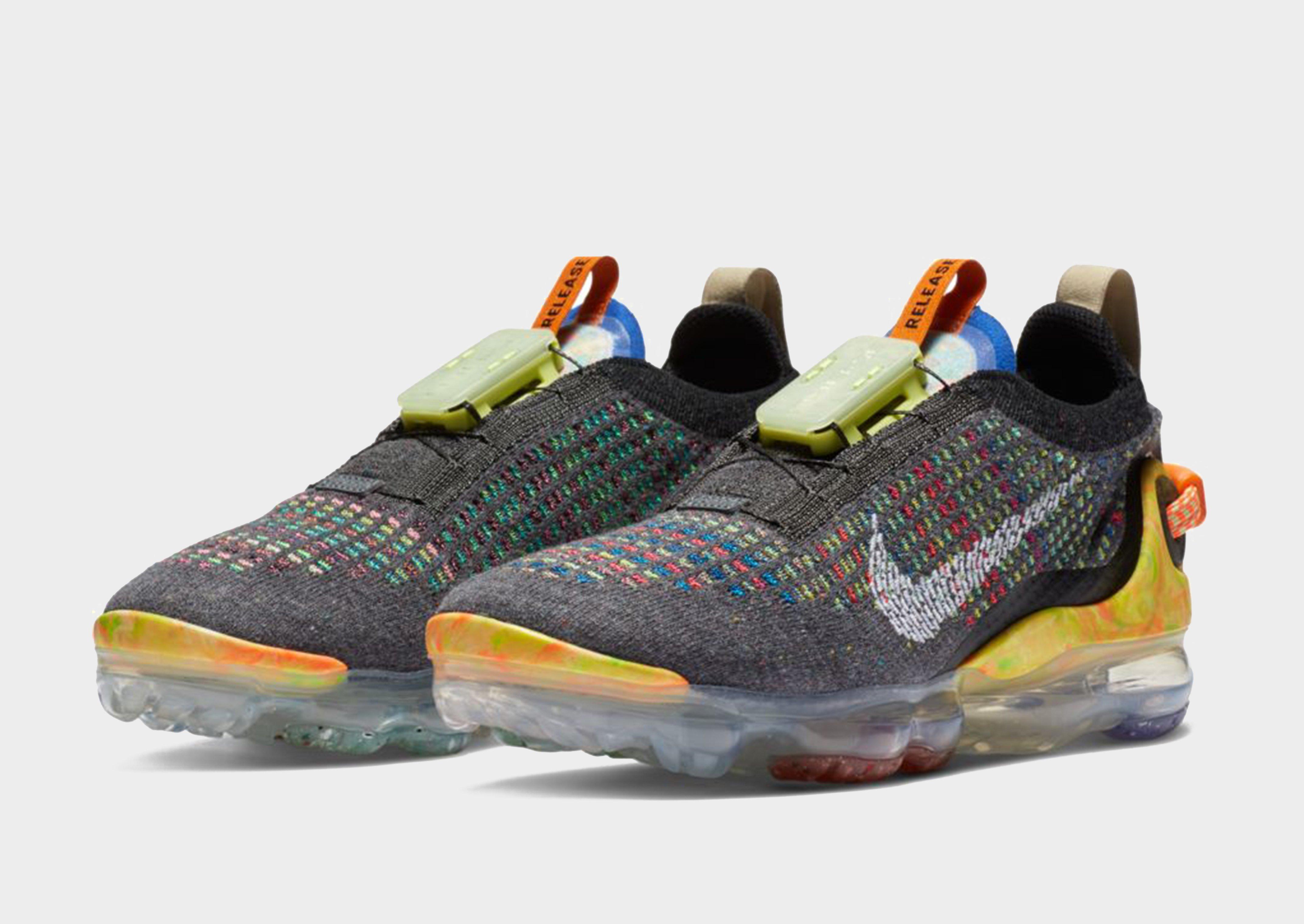 grey and yellow vapormax