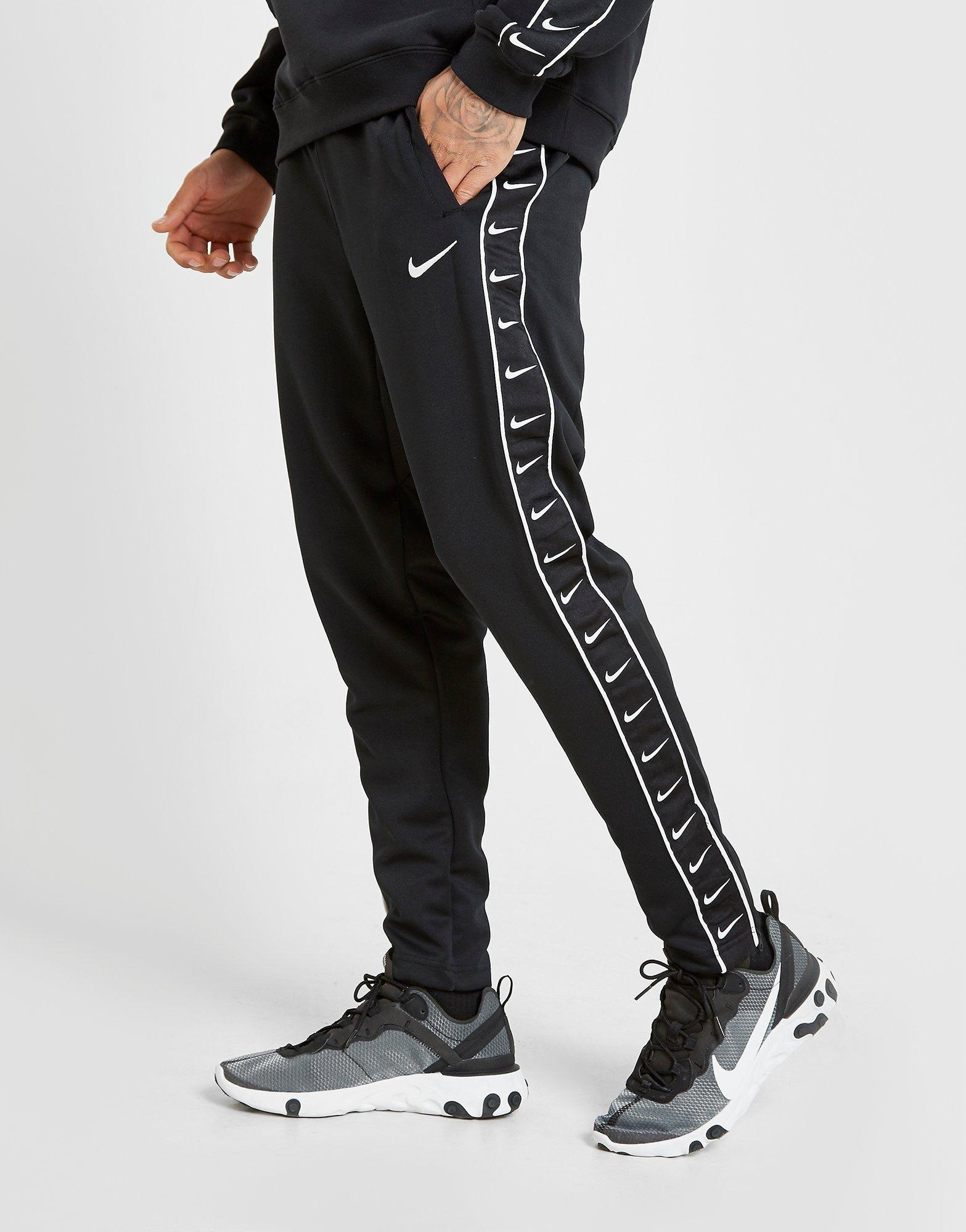 nike tape track pants