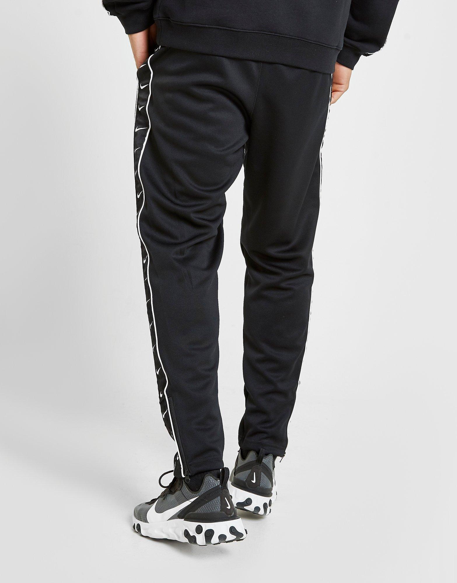 nike taped track pants black