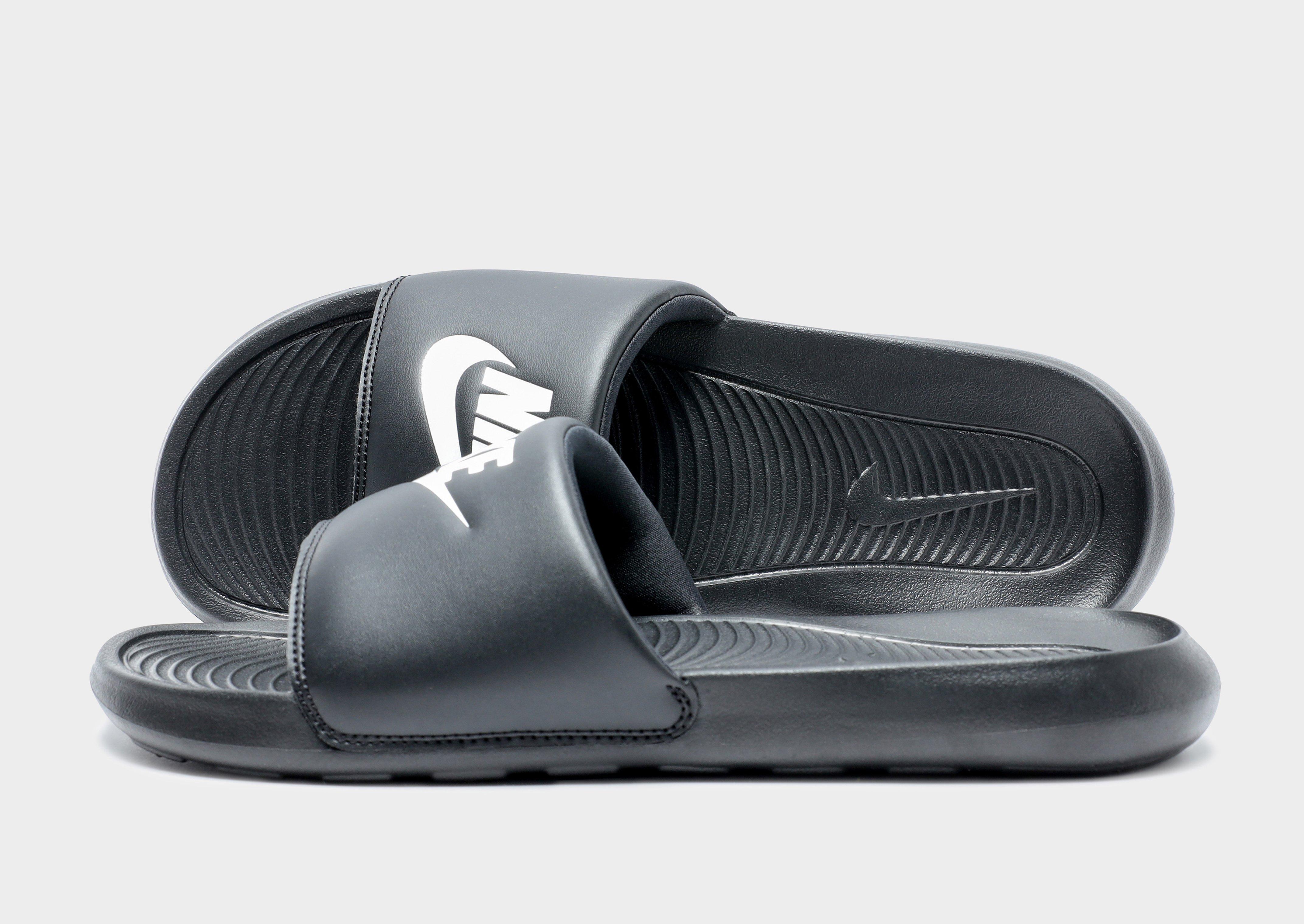 nike victori one sliders in triple black
