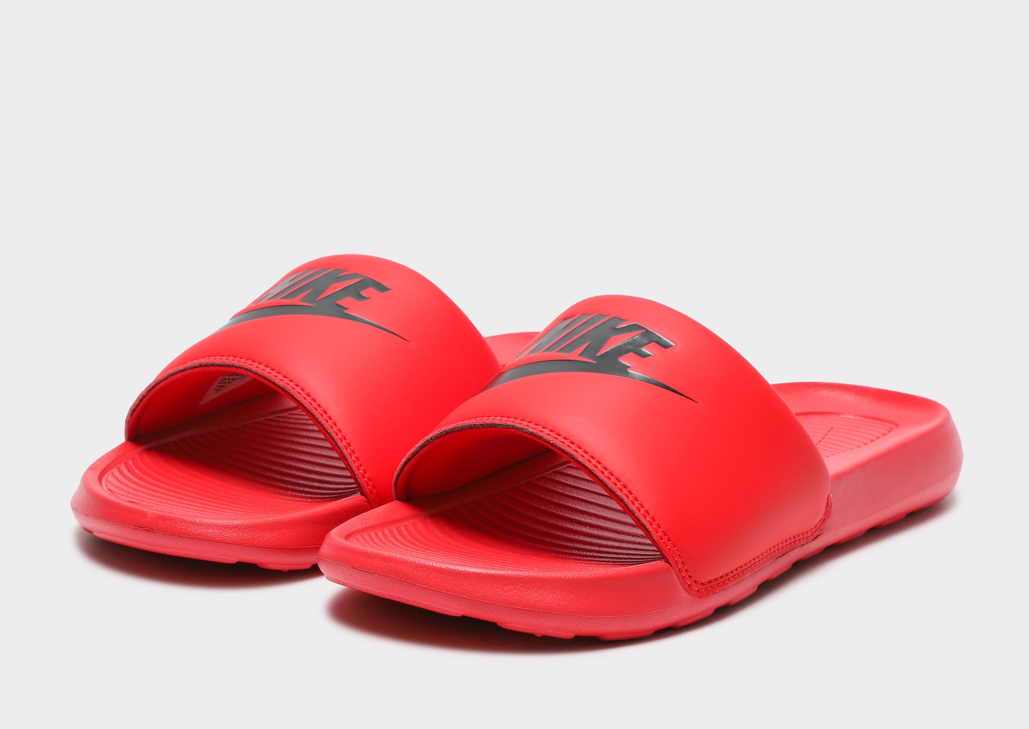 Red nike best sale kawa slides