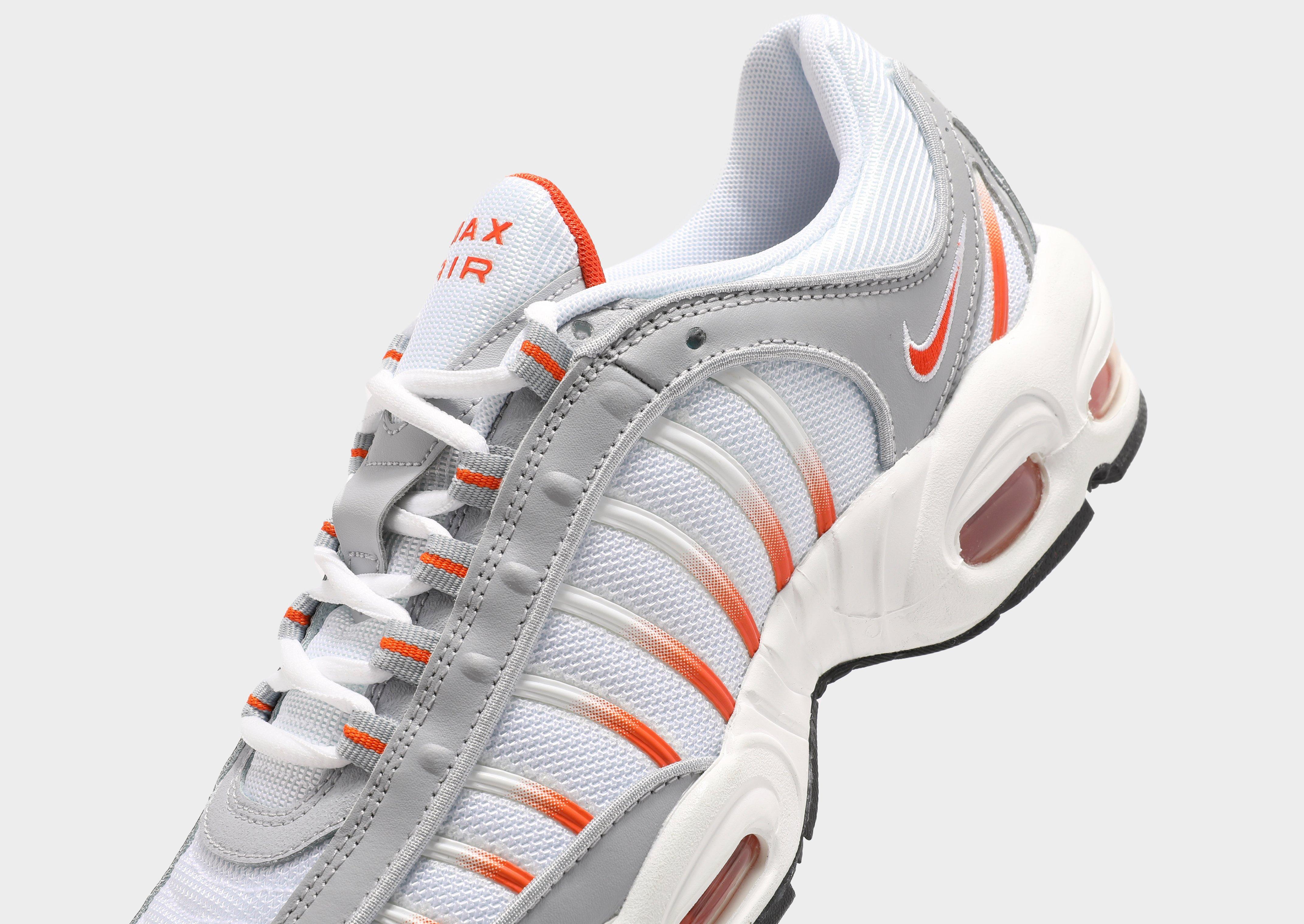 nike tailwind white orange