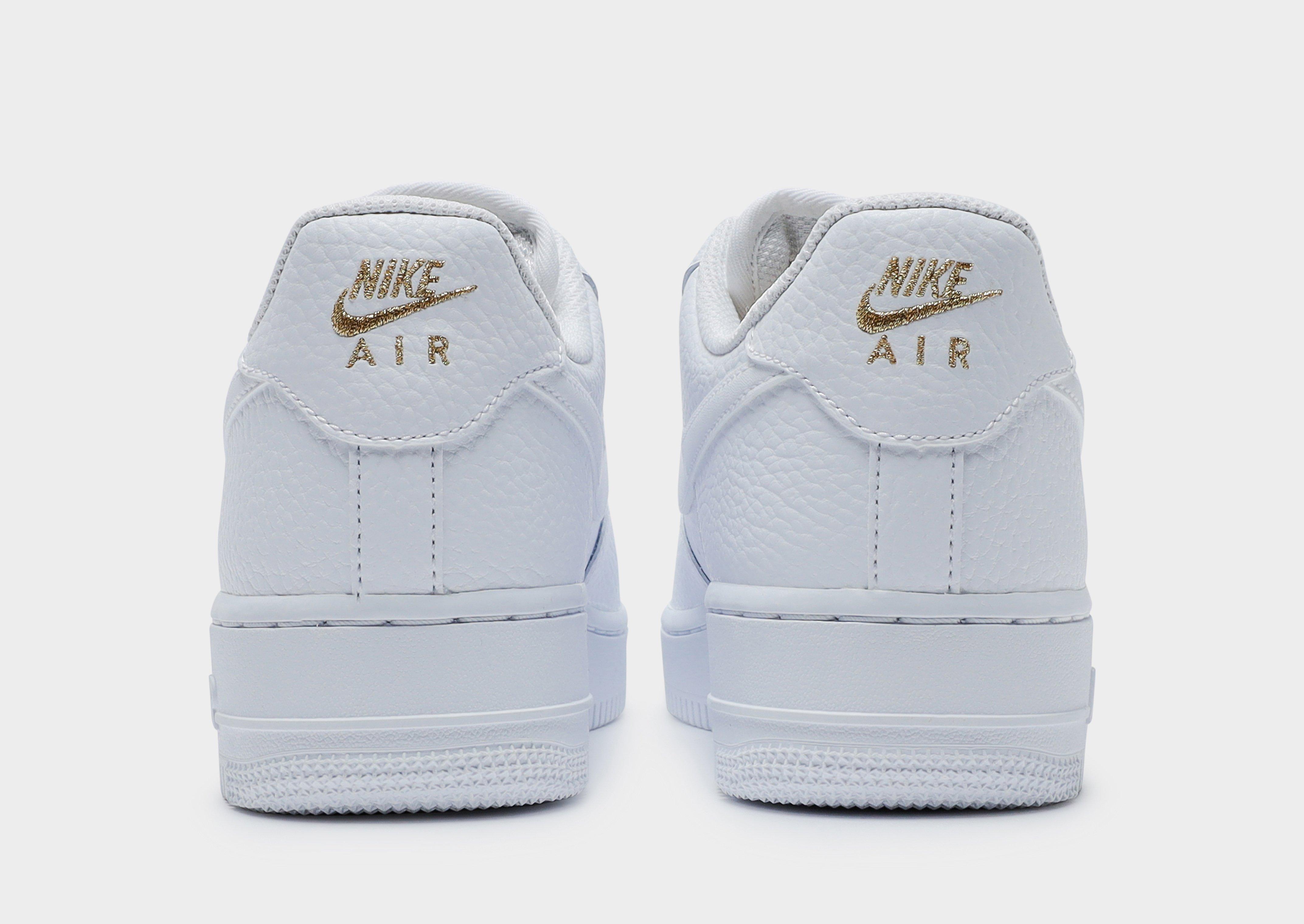 nike af1 gold swoosh