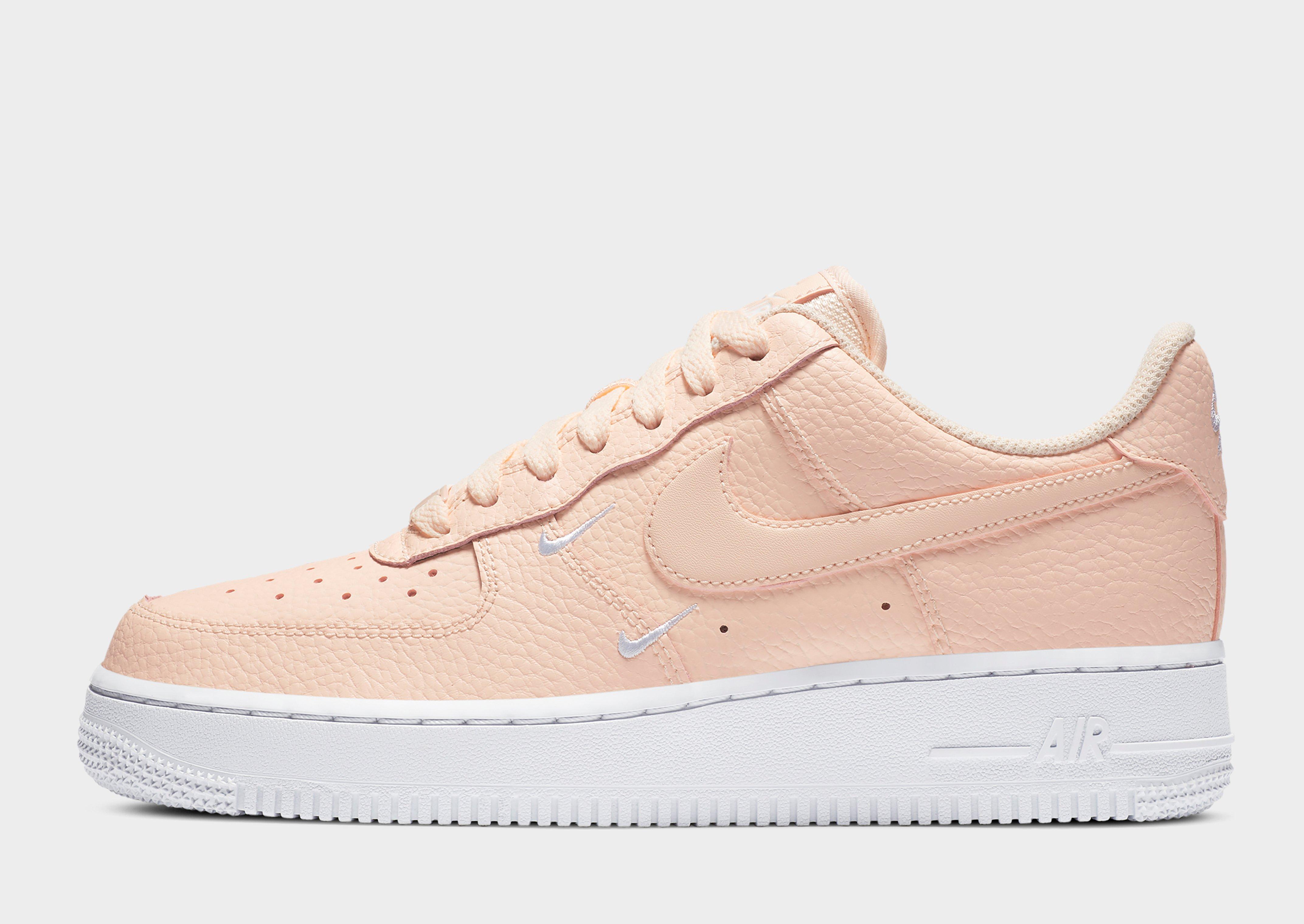 air forces with pink swoosh