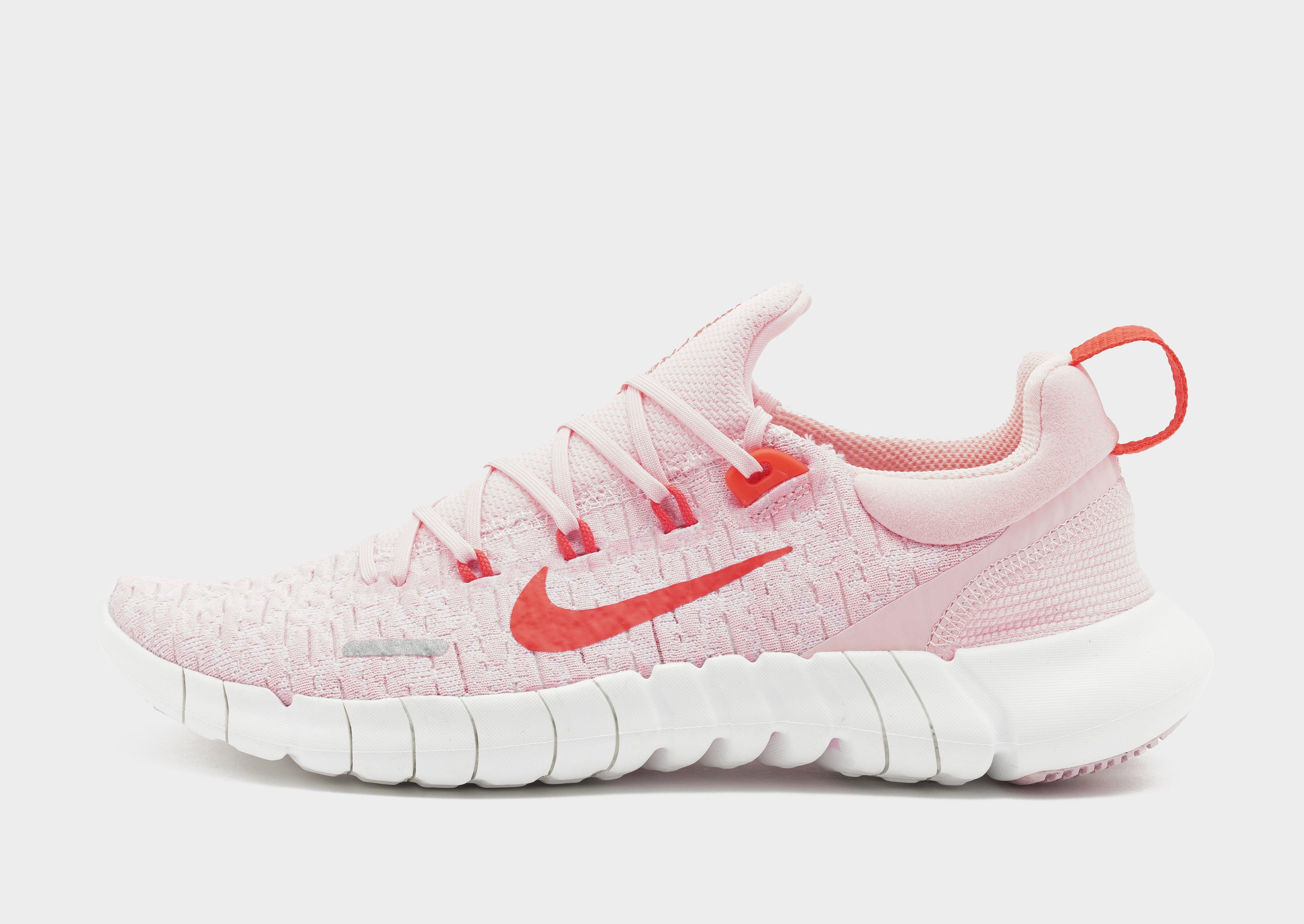 pink nike free run