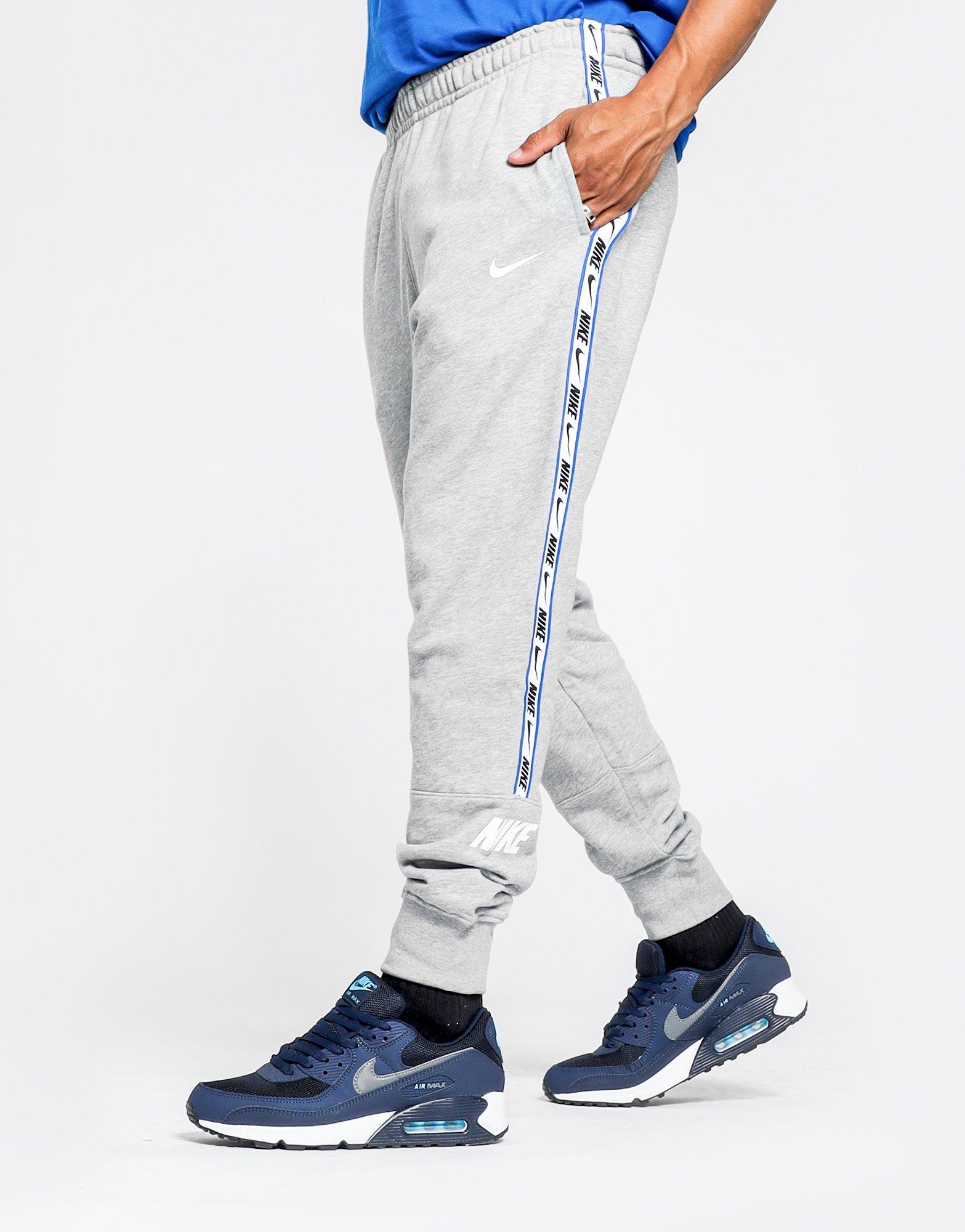 nike grey tape joggers