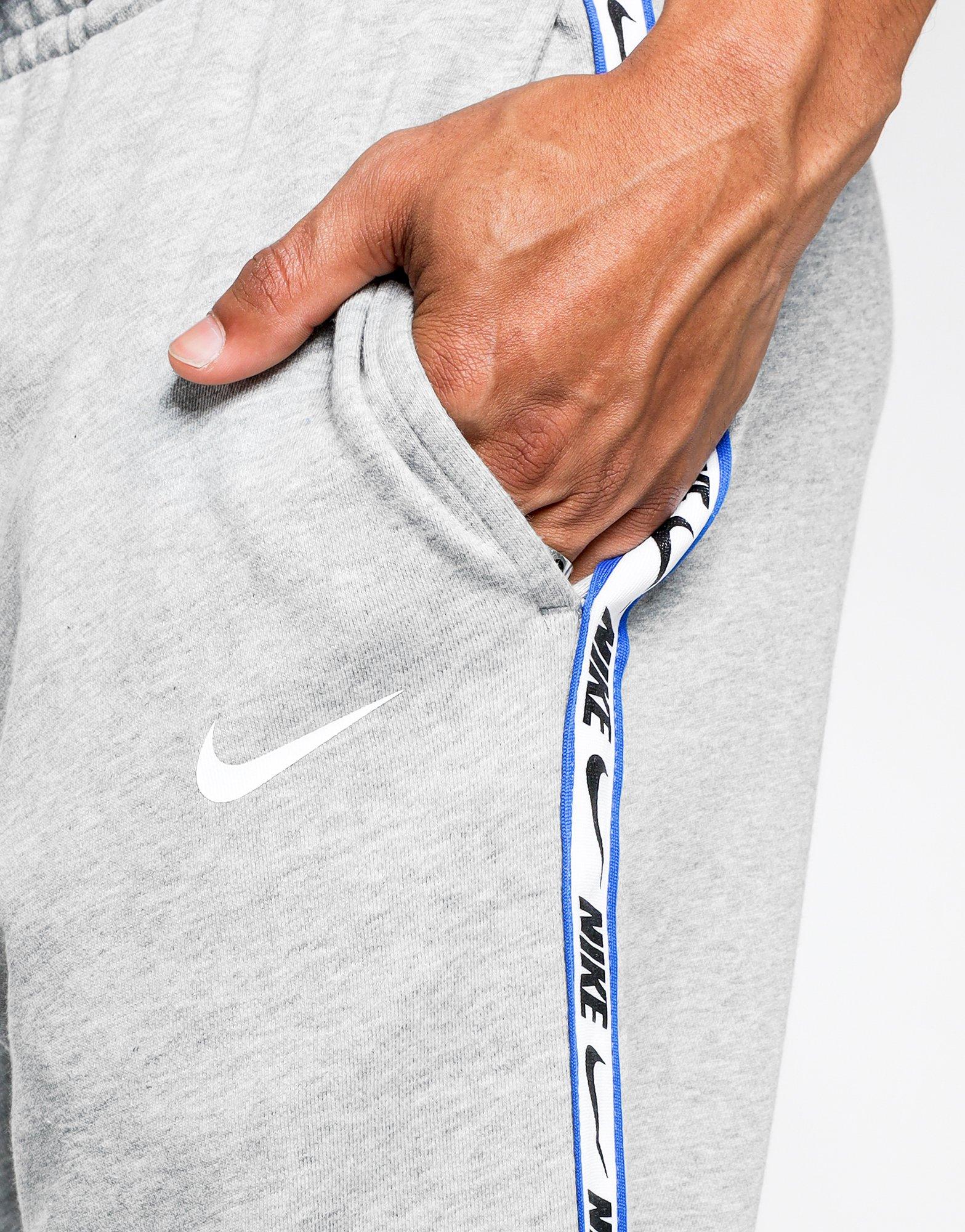 nike gel tape cuffed tracksuit