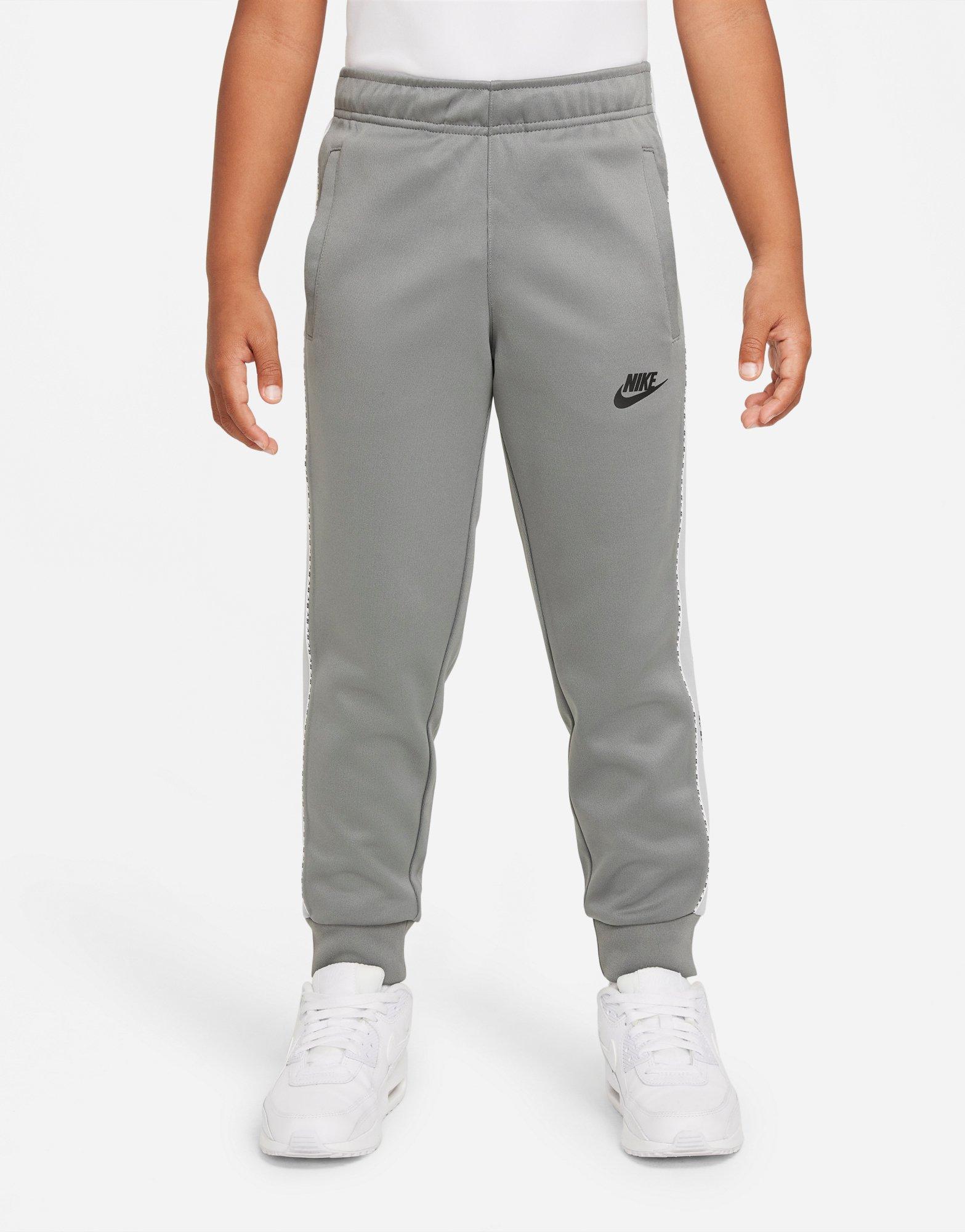 Nike tape poly joggers junior grey sale