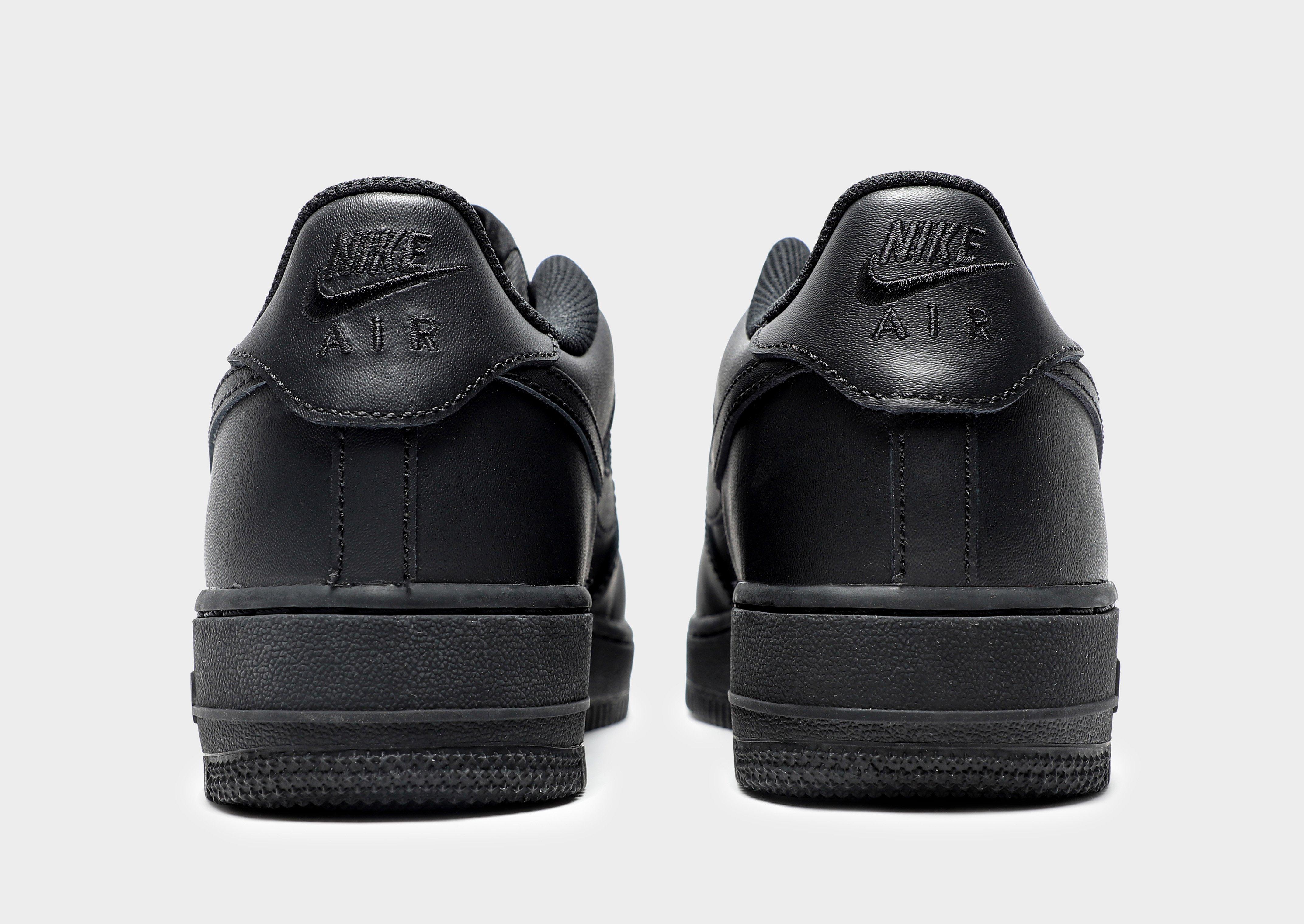 Junior black nike store air force 1