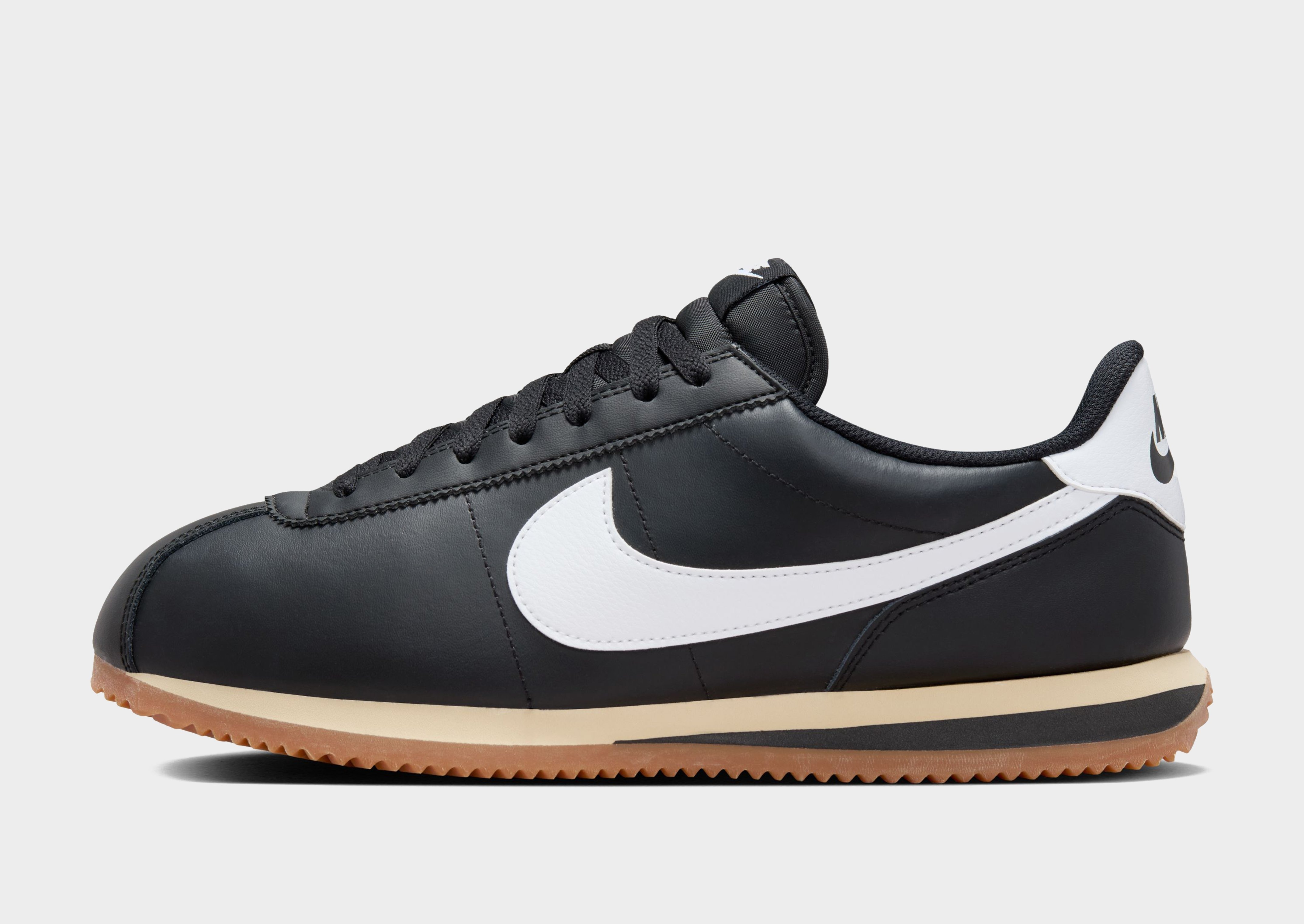 All black nike cortez shoes hotsell