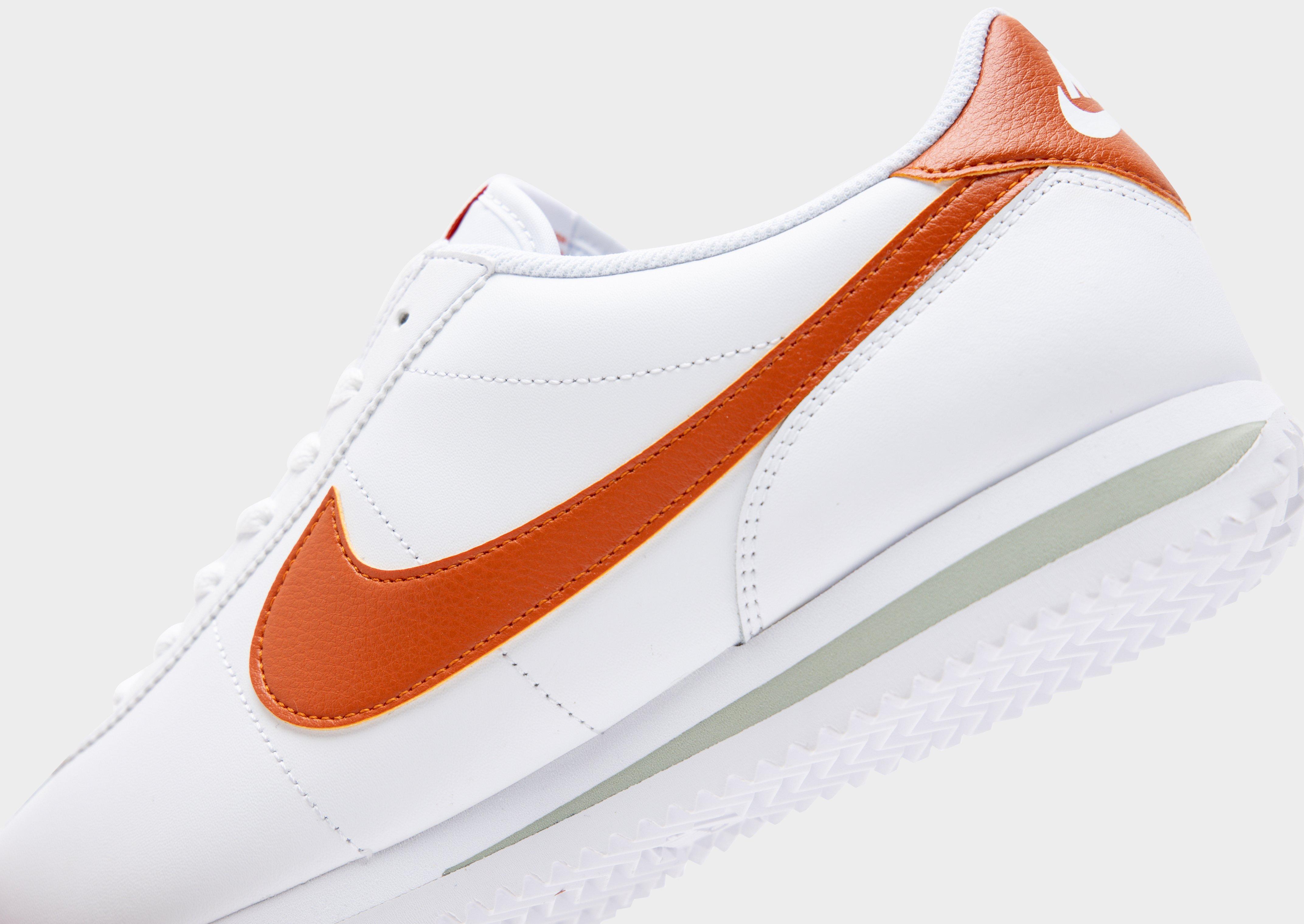 White and black hot sale nike cortez shoes