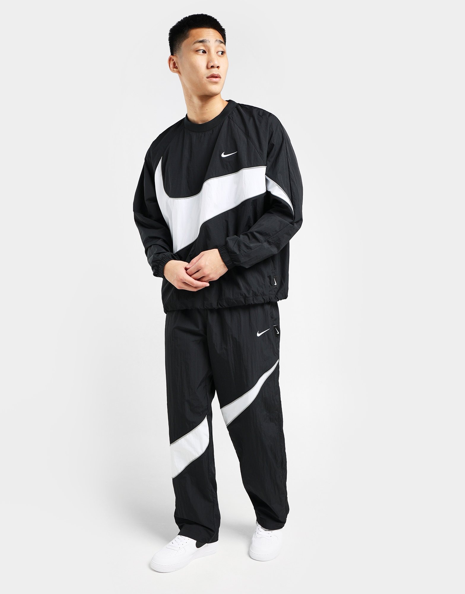Black Nike Sportswear Swoosh Woven Pants | JD Sports Malaysia