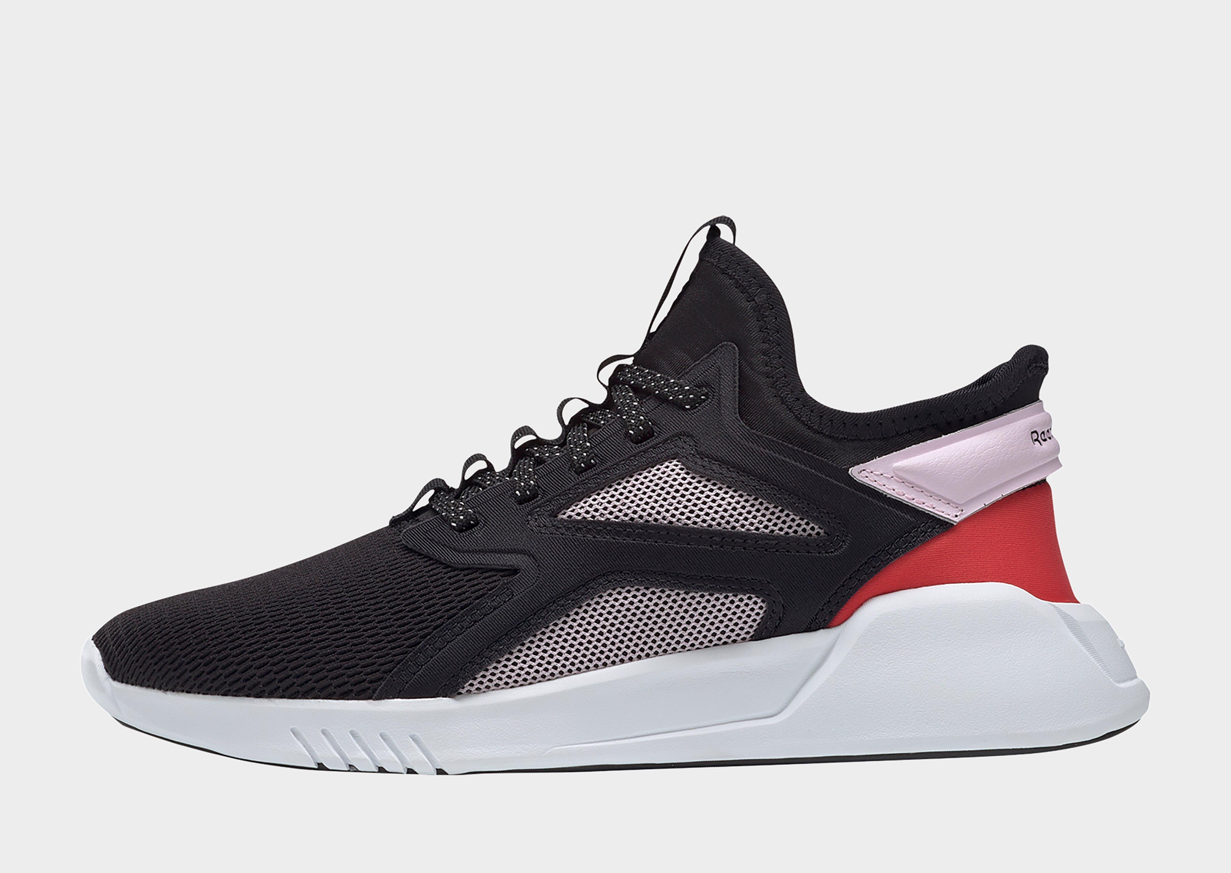 reebok training freestyle motion trainers in black