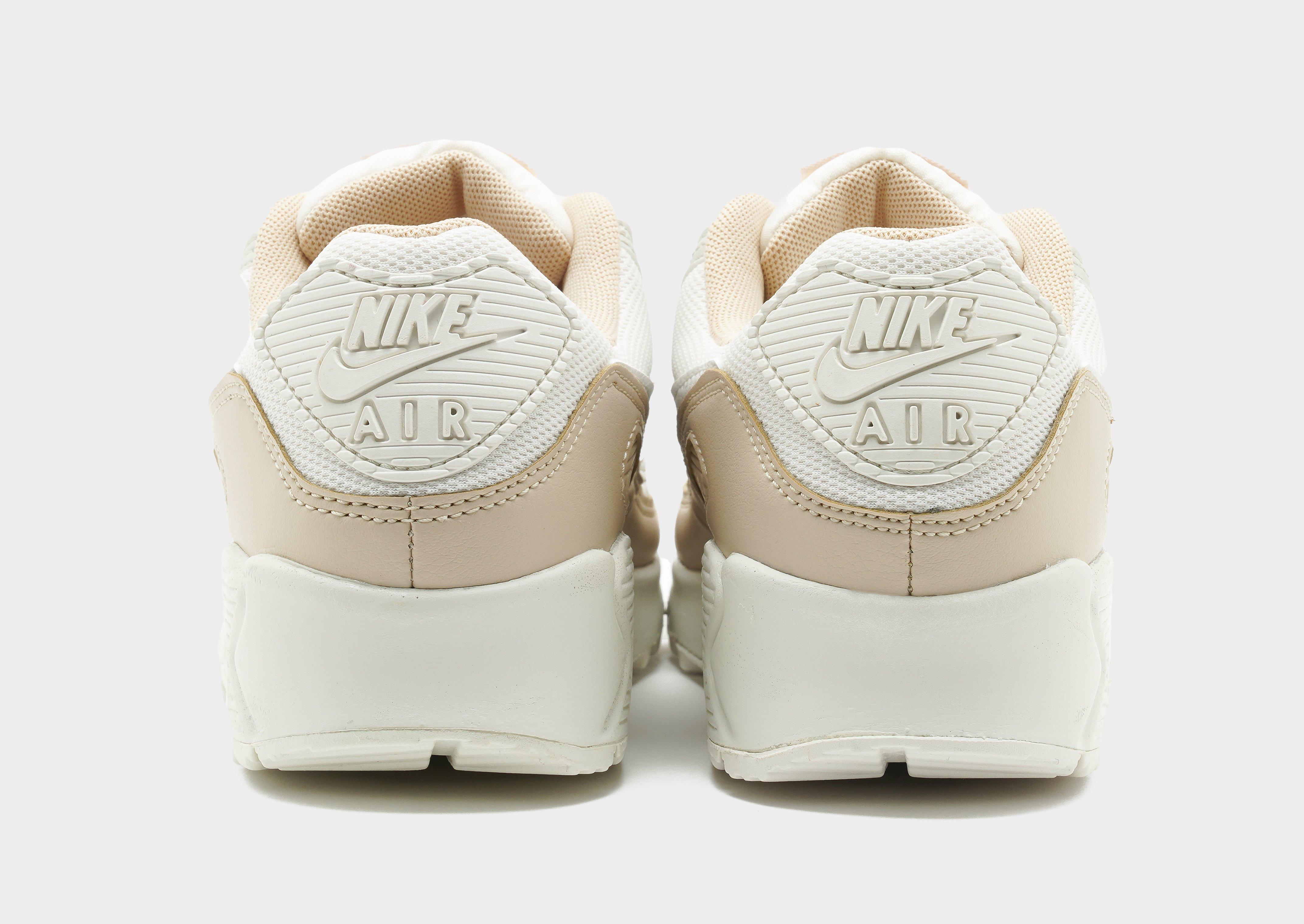 beige nike air