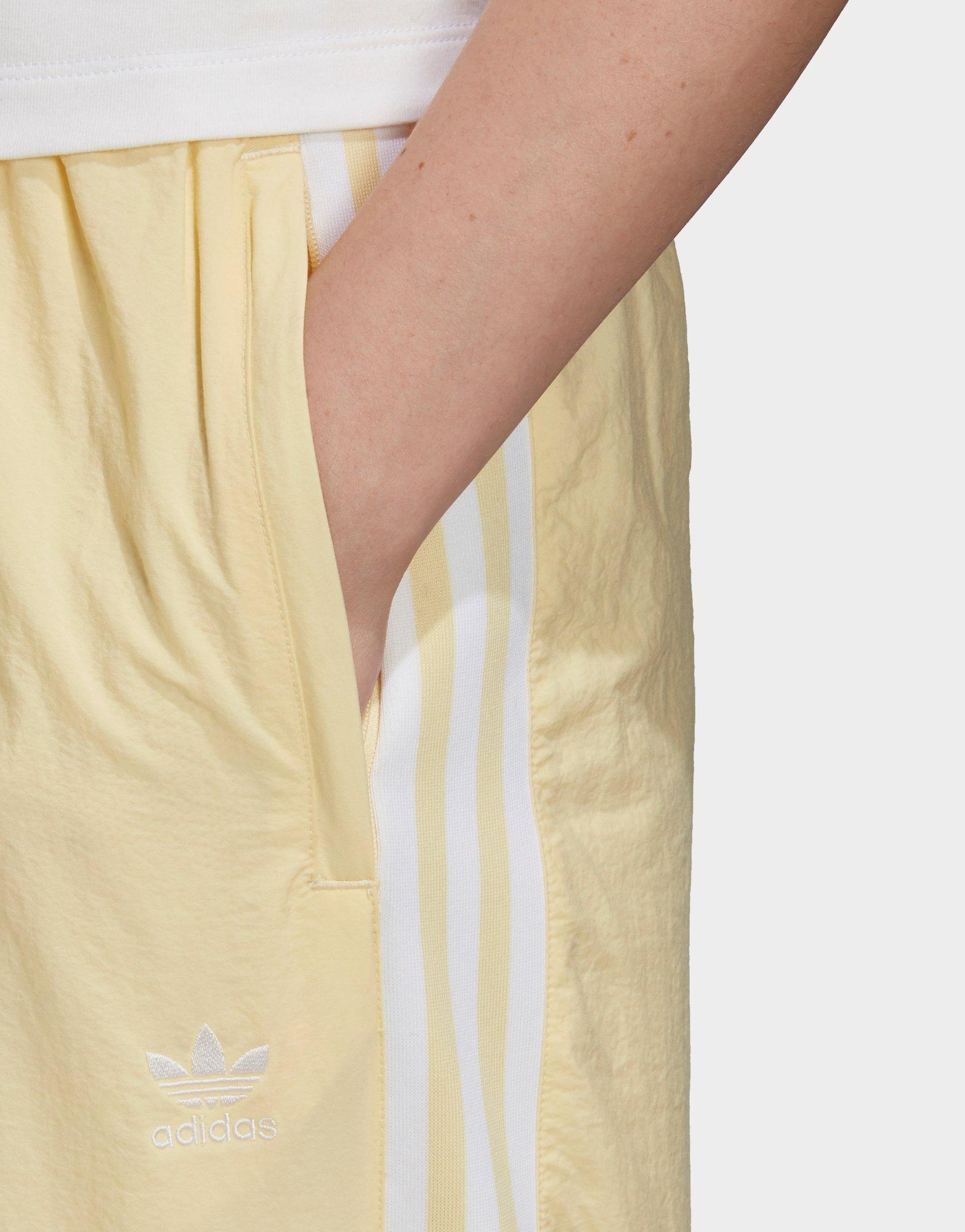 yellow adidas tracksuit bottoms