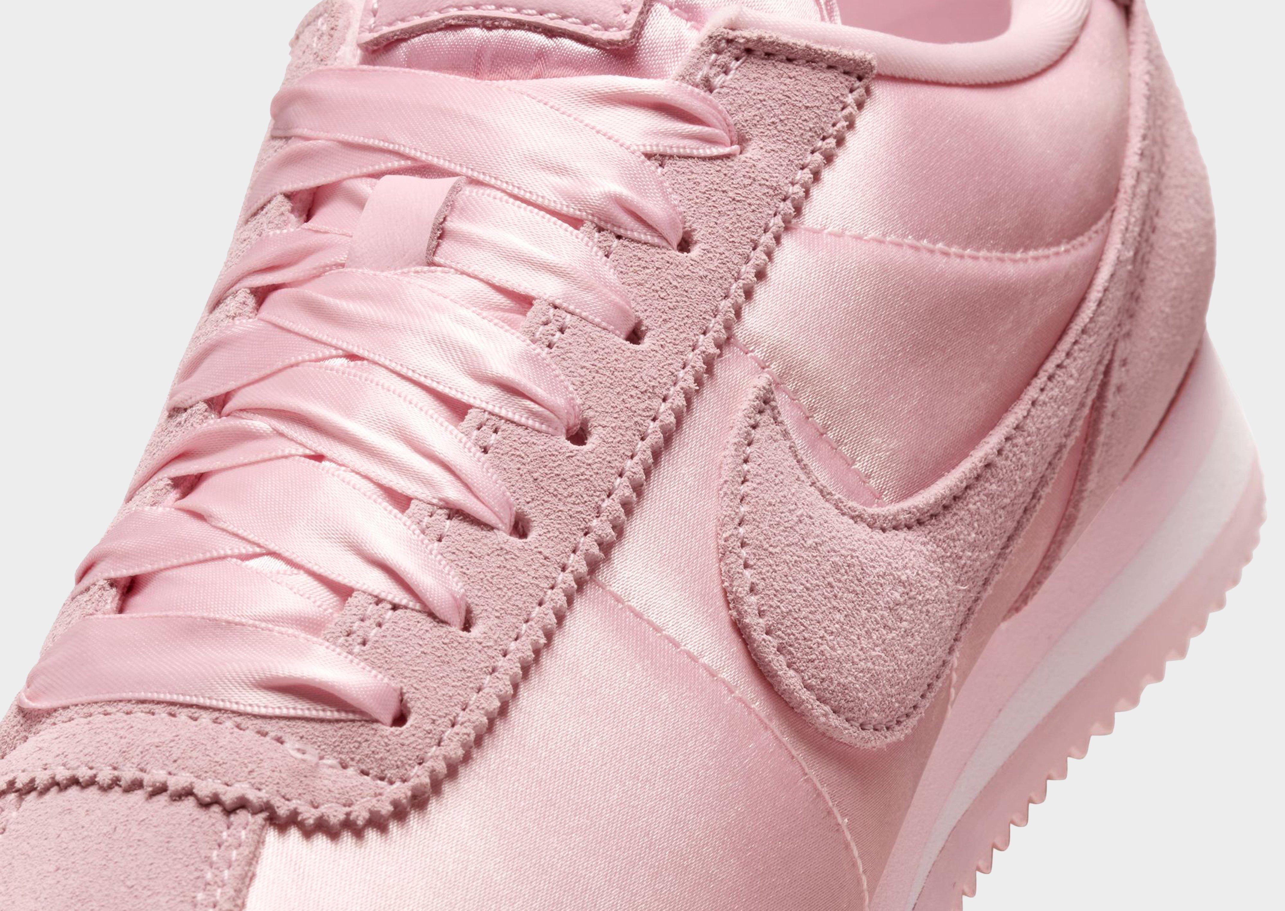 Nike women's classic cortez pink leather sneaker best sale