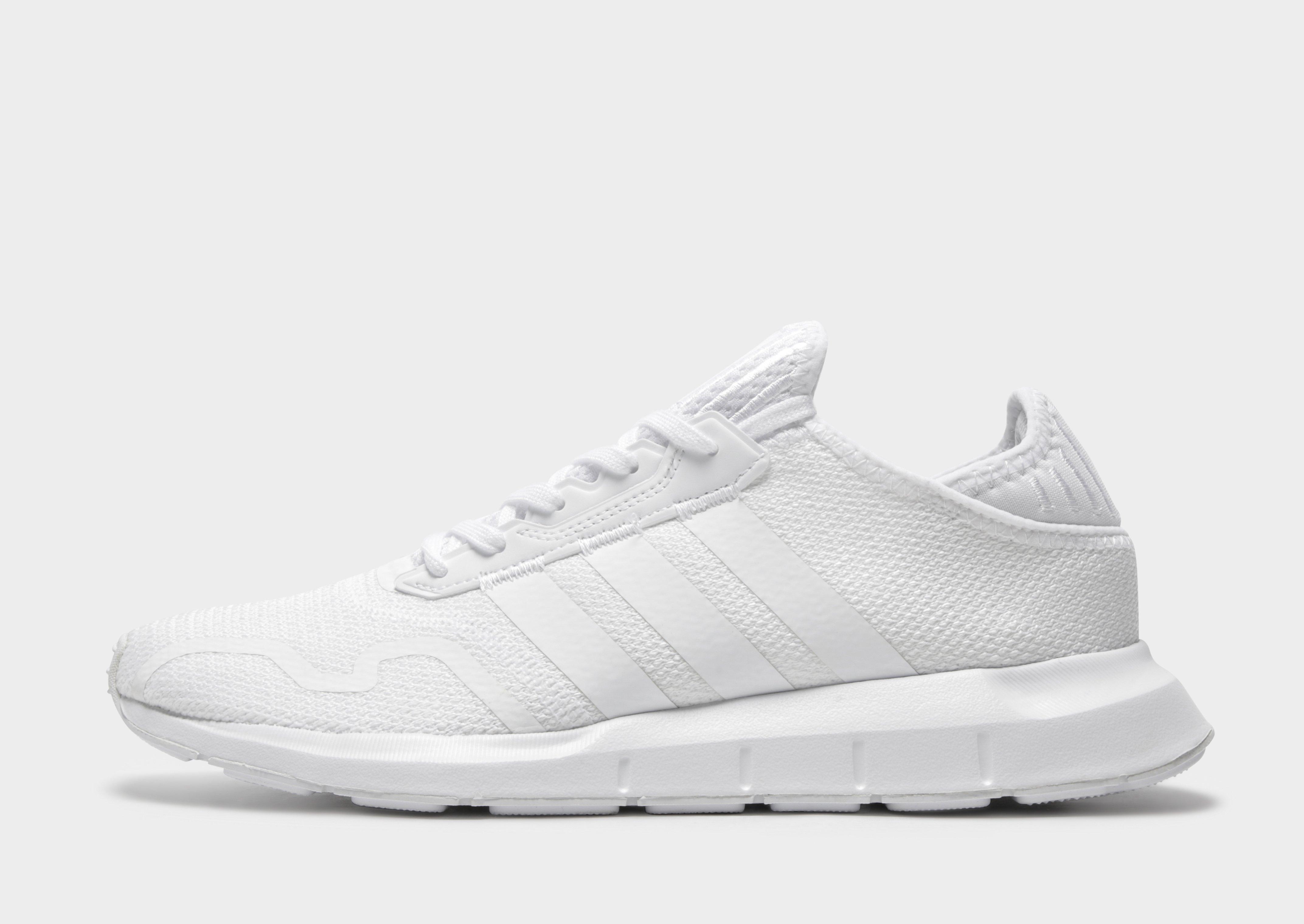 white adidas swift run