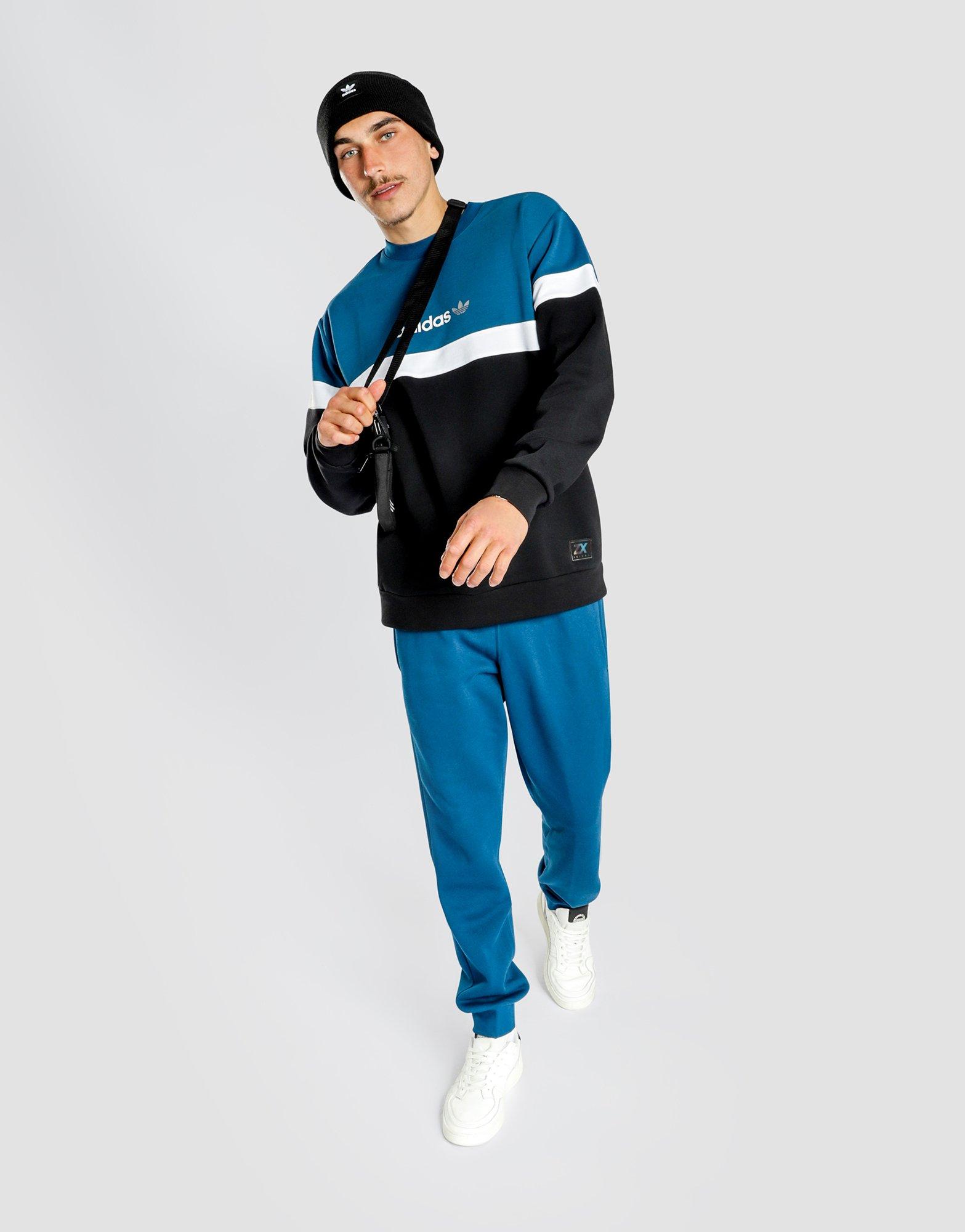 blue adidas track pants