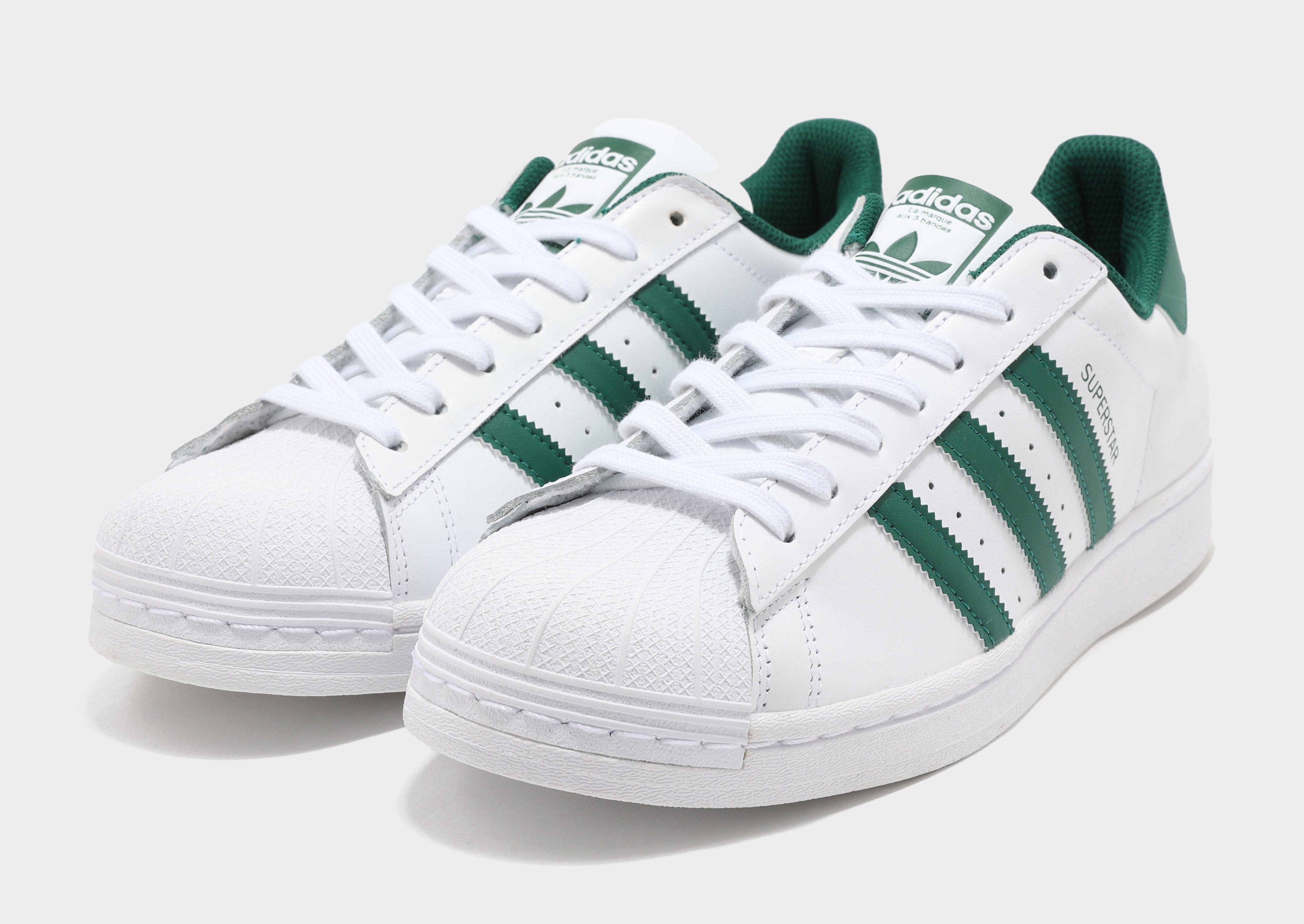 Adidas originals superstar sale trainers in white