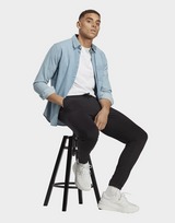 adidas Pantalon fuselé élastique en jersey avec logo Essentials