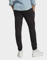 adidas Pantalon fuselé élastique en jersey avec logo Essentials